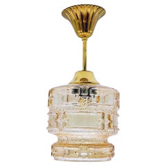 1970s Amber glass & brass pendant light