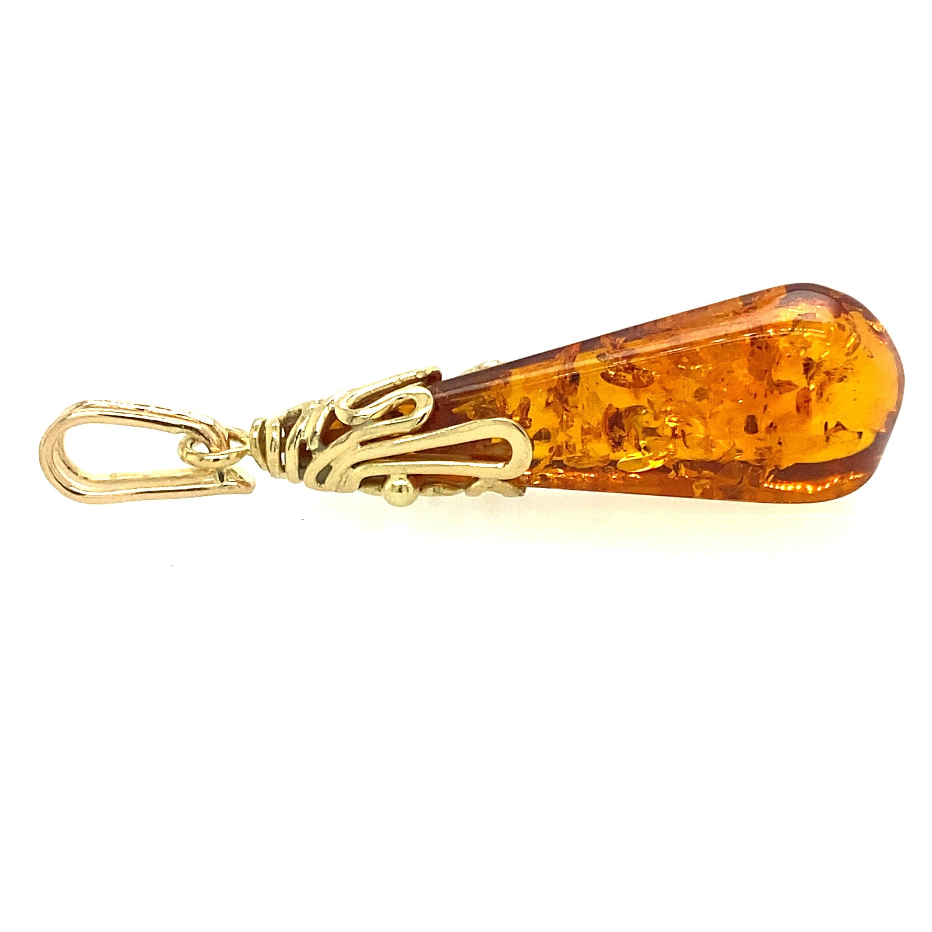 Modern Amber Pendant in 14 Karat Yellow Gold 1970s