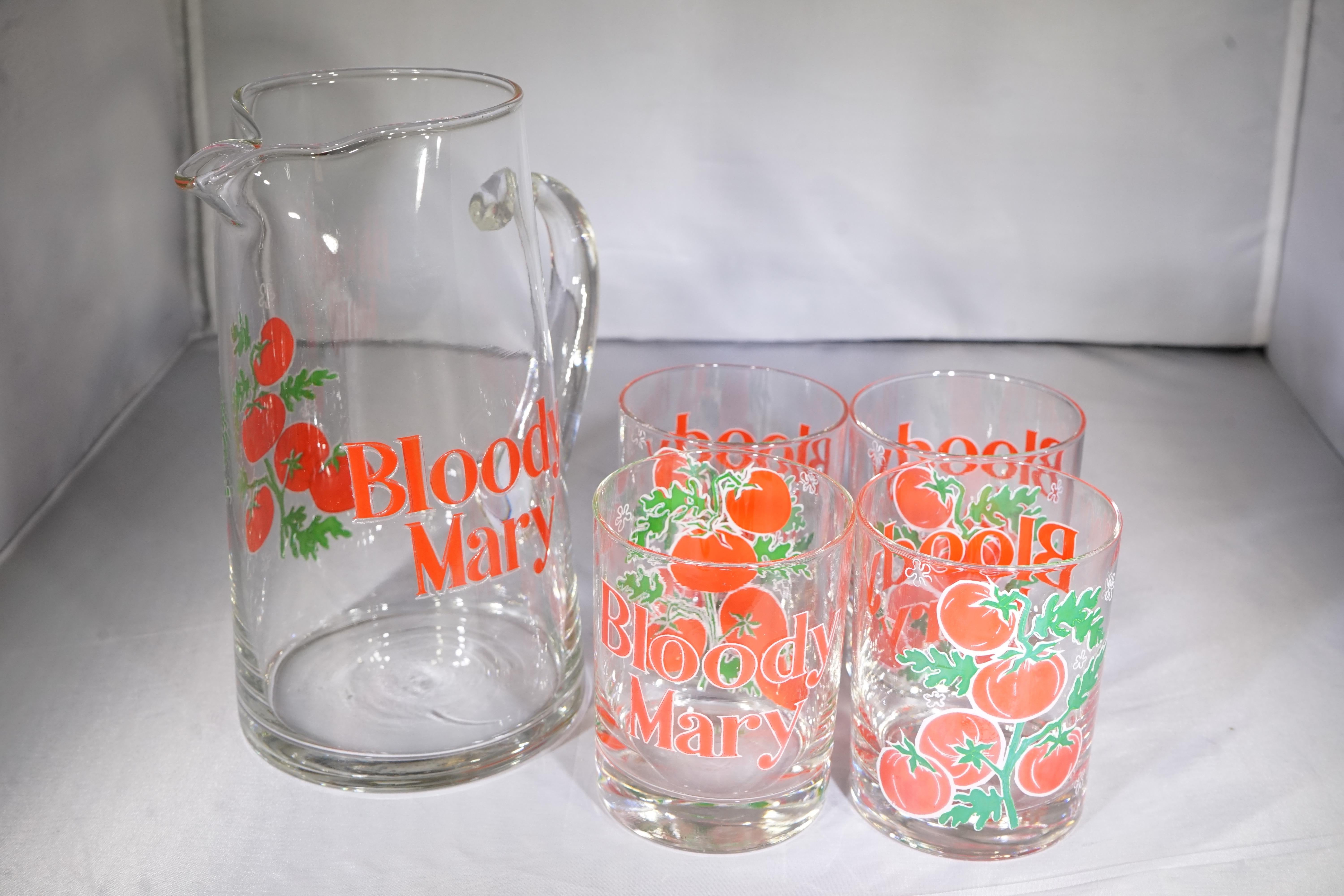 Midcentury American five-piece Bloody Mary glassware set featuring four glasses and pitcher with tomato designs and 