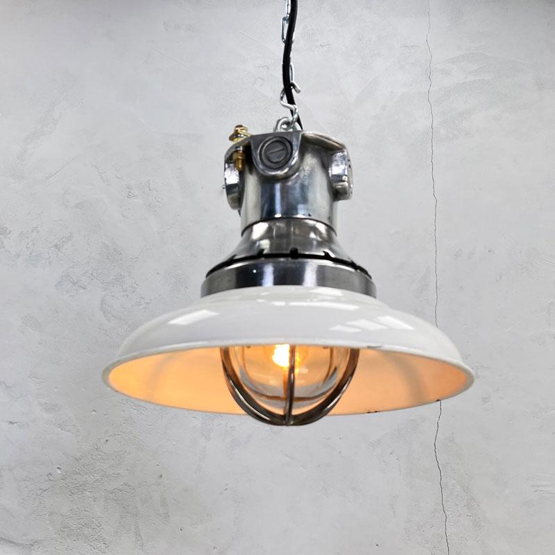 Vintage white enamel ceiling pendant lighting manufactured by Killark Electric a US company established in 1913. Killark design & manufacture products for hazardous industrial locations. Their range encompasses industrial and explosion proof