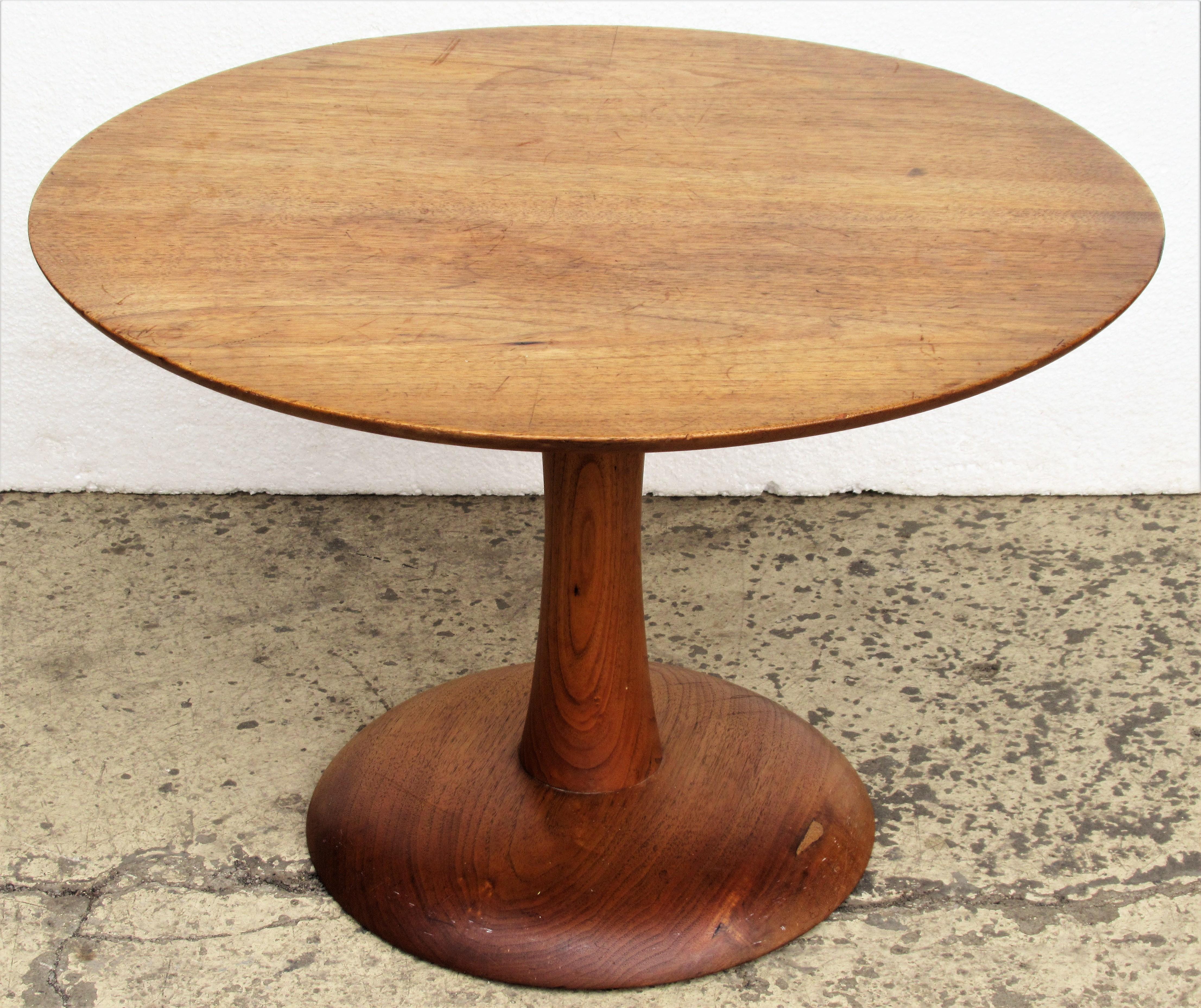 1970s American studio craft movement turned wood circular pedestal table with nice old color, beautiful graining and a great looking simple organic modernist design. Signed on underside. Wendell Smith - 1974. Wendell Smith was one of the three