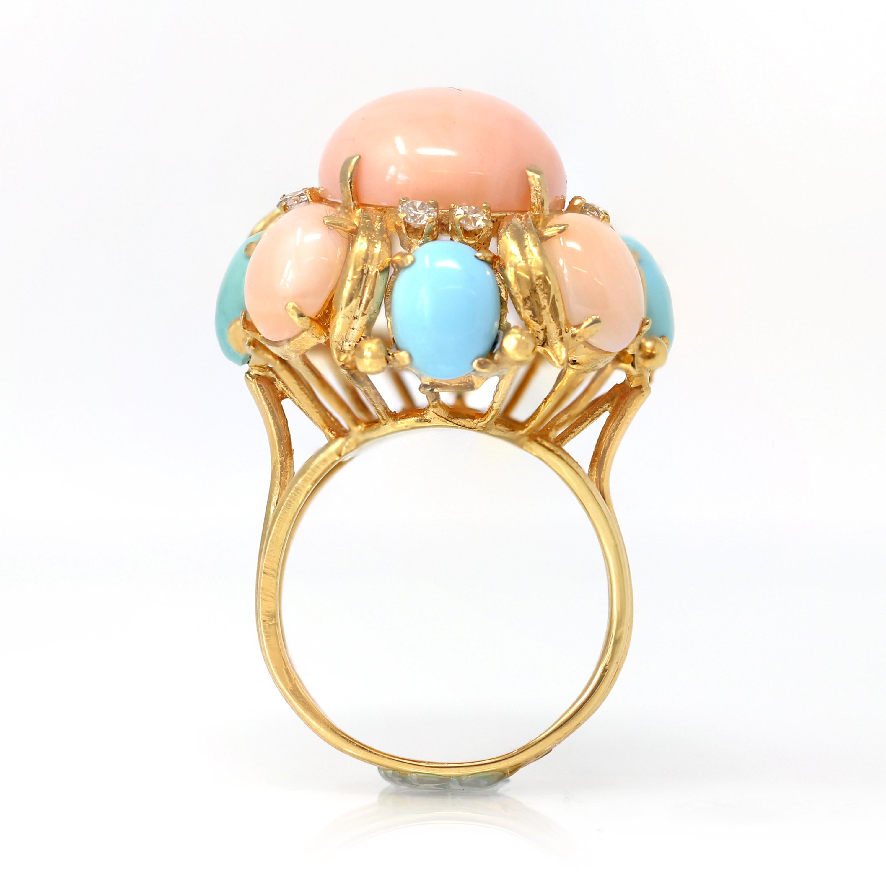 A ravishing Angel skin coral, turquoise and Diamond ring, set in 14k yellow gold circa 1970, the ring is a size 10&1/4 and would be easily sizable. This very attractive Angel skin coral and turquoise cabochon ring is an original vintage piece from