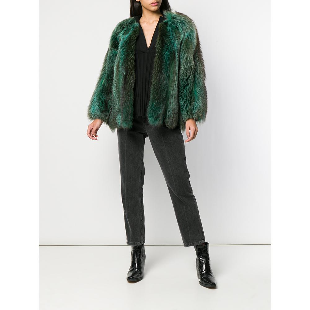 Tuttabankem for Philip Hockley dyed fox coat. Pastel green suede base and brown fur with green shades. Concealed hook closure. Black lined. Tight fit.

The item shows signs of wear along the internal suede edges, as shown in the pictures.

Please