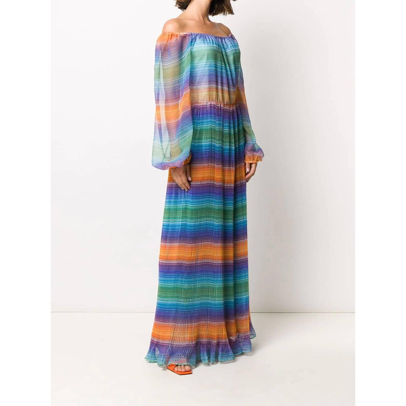 A.N.G.E.L.O. VINTAGE – Italy

A.N.G.E.L.O. Vintage Cult semitransparent multicolor maxi dress. Off-the-shoulder design, elasticated neckline, long puff sleeves, stretchy cuffs and fully pleated wide skirt with gathered hem. Side zip fastening and