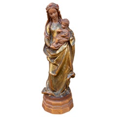 1970s Antique Style Sculpture of the Virgin and Child in Carved and Gilded Wood