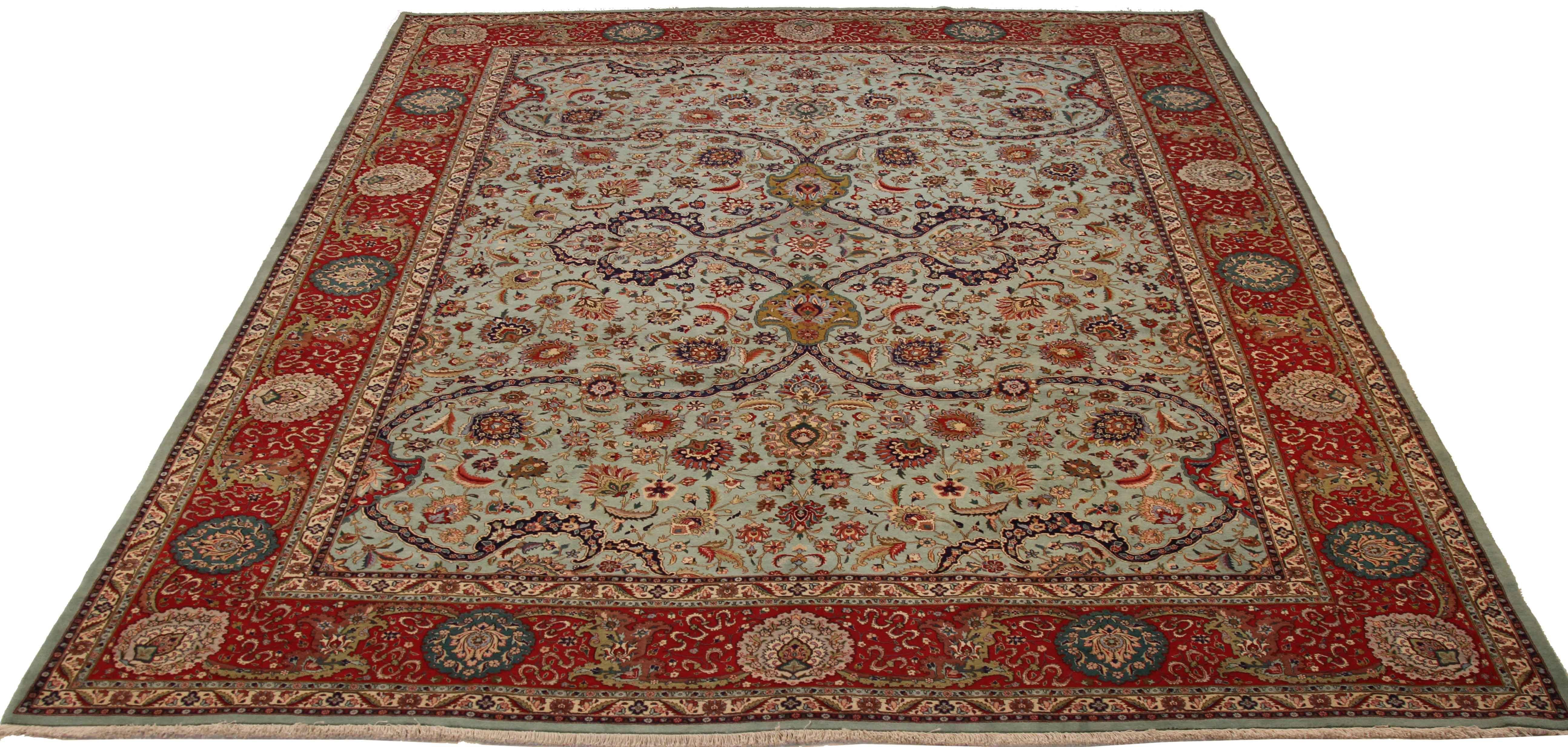 Hand-Knotted 1970s Antique Tabriz Persian Rug with a Grand Blue and Red Floral Design For Sale