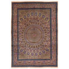 Alfombra persa Tabriz antigua de los años 70 con motivos florales circulares en verde y rojo