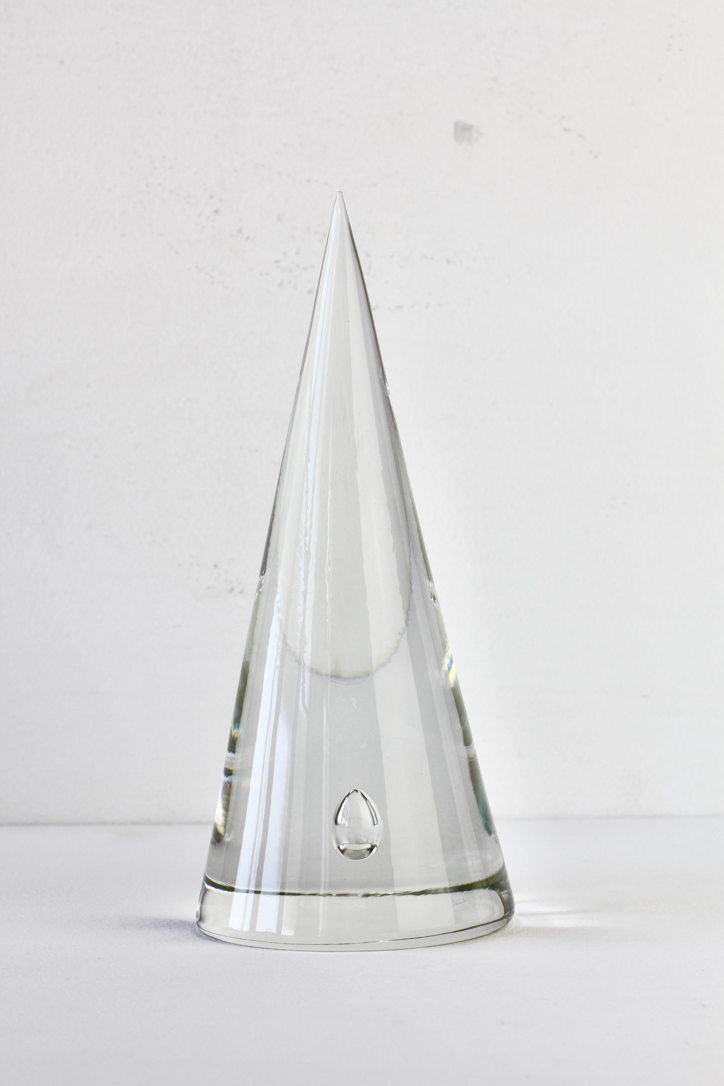 Rare, Mid-Century Modern vintage signed cone shaped paperweight with singular trapped air bubble inclusion within the clear glass. The design of this conical shaped desk paperweight / ornament is attributed to master Murano glass designer Antonio da