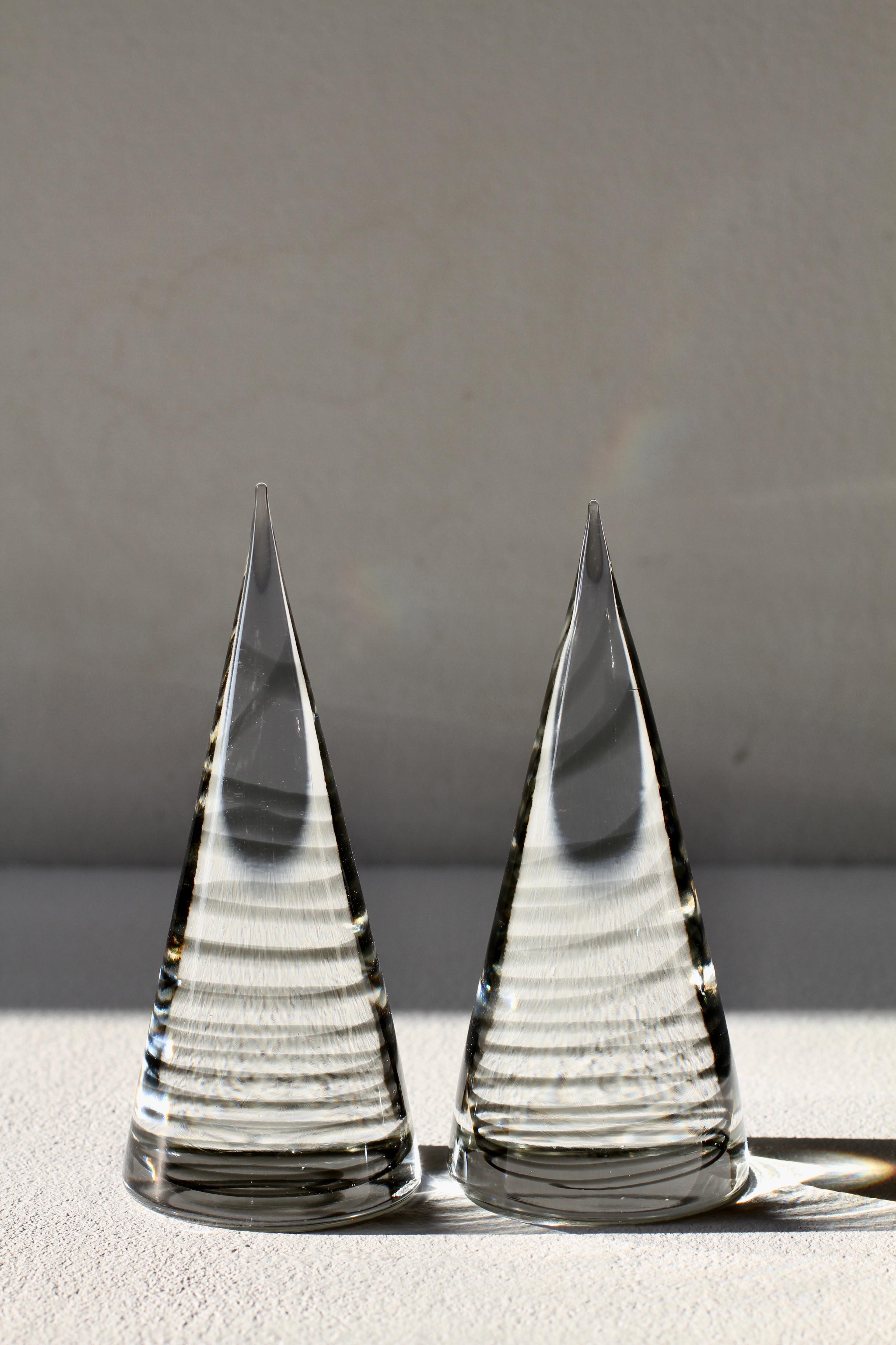 Rare pair of Mid-Century Modern vintage signed cone shaped paperweights with grey spiral inclusion within the clear glass. The design of this conical shaped desk paperweight / ornament is attributed to master Murano glass designer Antonio da Ros for