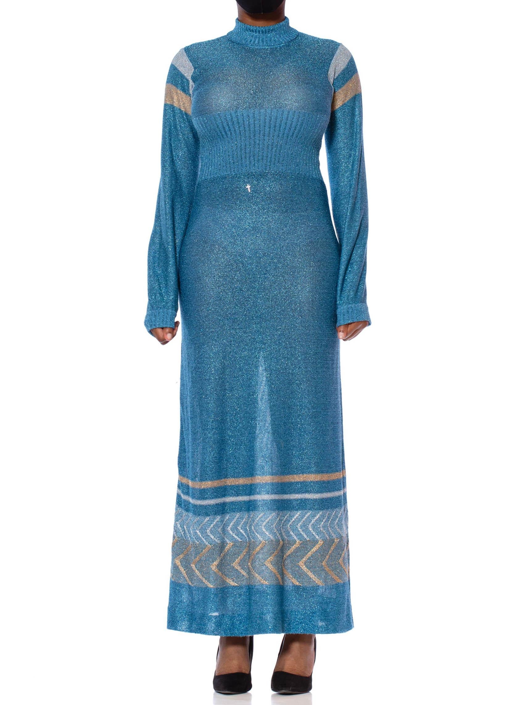 1970S Aquamarine Blue Poly/Lurex Knit Long Sleeved Maxi Dress With A Gold & Silver Deco Border
