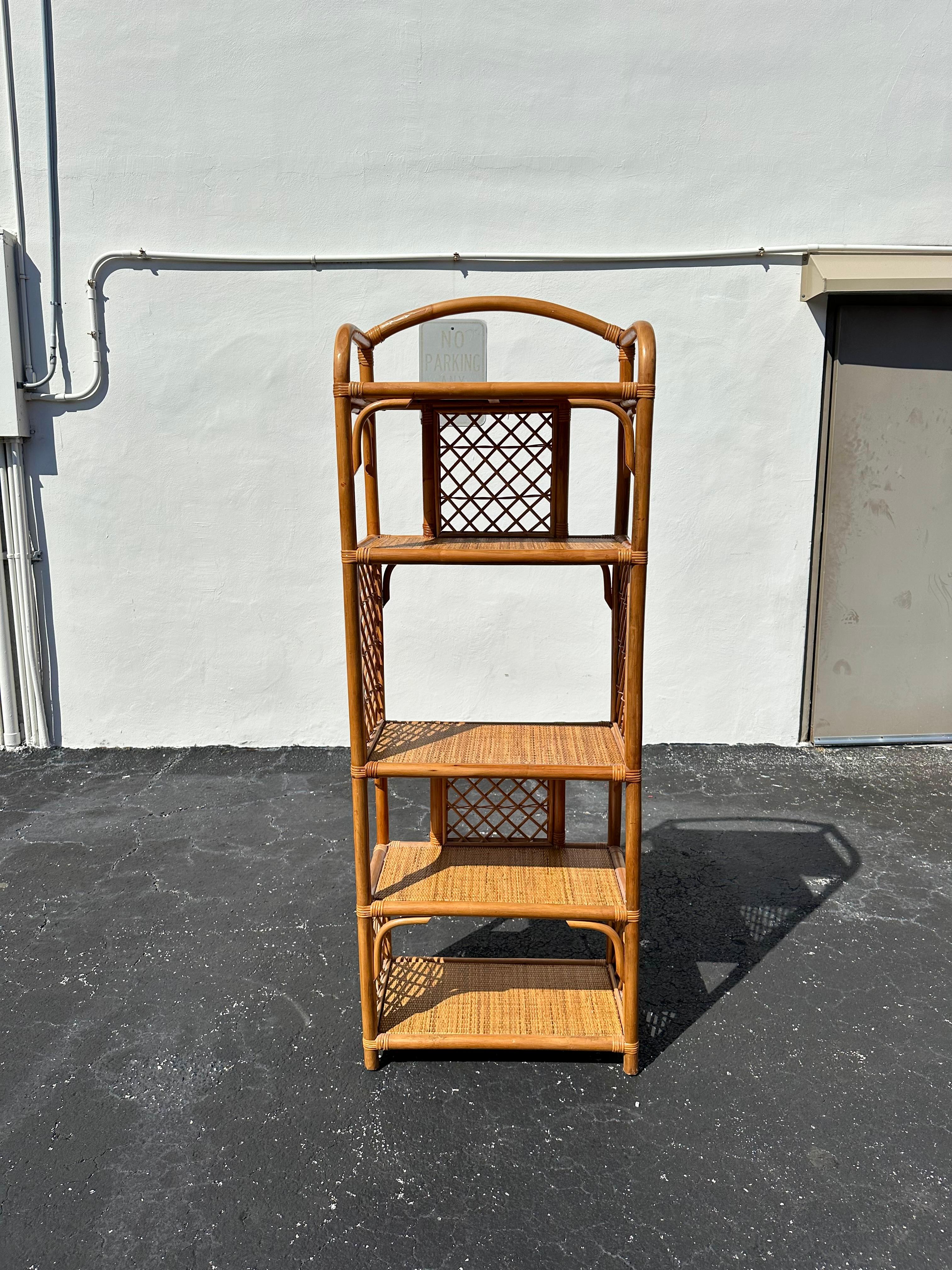On offer on this occasion is one of the most stunning and rare, rattan and caned display shelf you could hope to find. In original and unfinished condition. Outstanding design is exhibited throughout. The beautiful shelf  is statement piece and