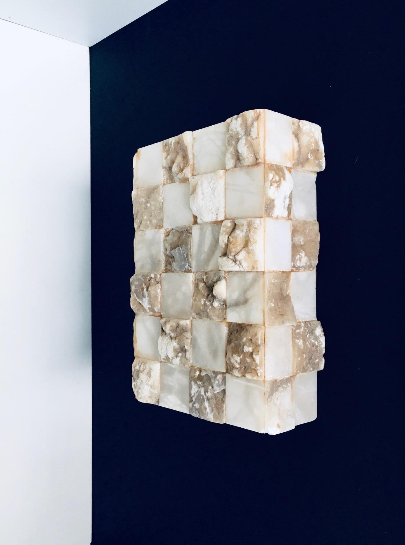 Vintage Architectural Onyx Stone Sconce Wall Lamp - model 1. Made in Italy, 1970's period. Onyx stone carved and fitted together to make this large rectangular sconce. This comes in very good condition, with lamp fitting wall plate. This takes 2