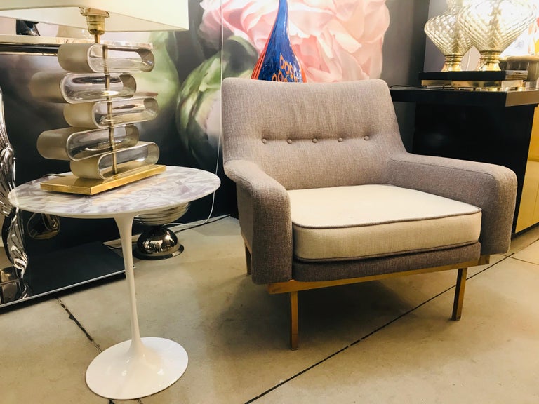 A very elegant and comfortable vintage Italian armchair of great execution by Arflex with large cozy seat, the design is superb with a curved back and the side edges protruding to smoothly create the armrests and to enhance the shape of the back.