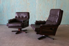 1970s Arne Norrell Pair of Stitched Leather Lounge Pedestal Swivel Chairs