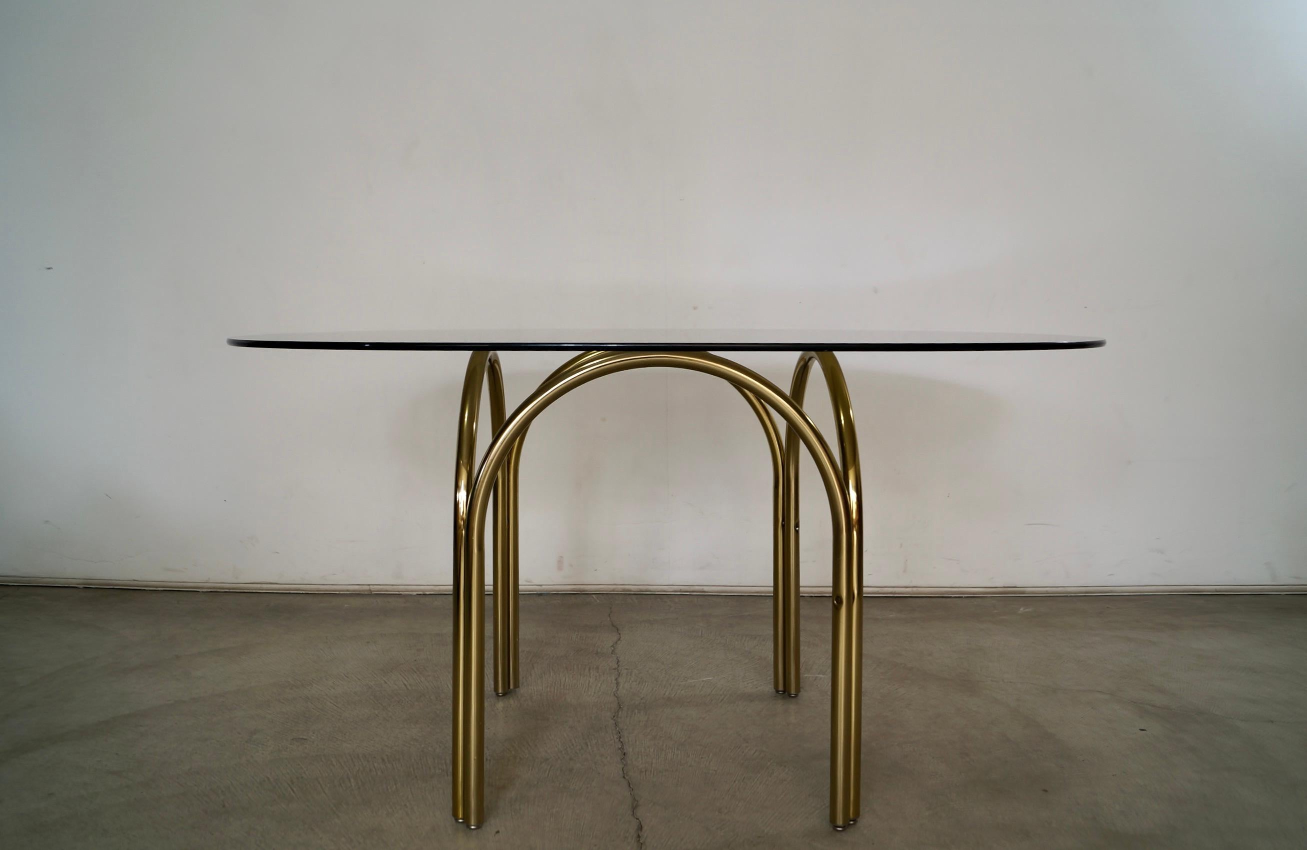 American 1970's Art Deco Hollywood Regency Brass & Smoked Glass Dining Table For Sale