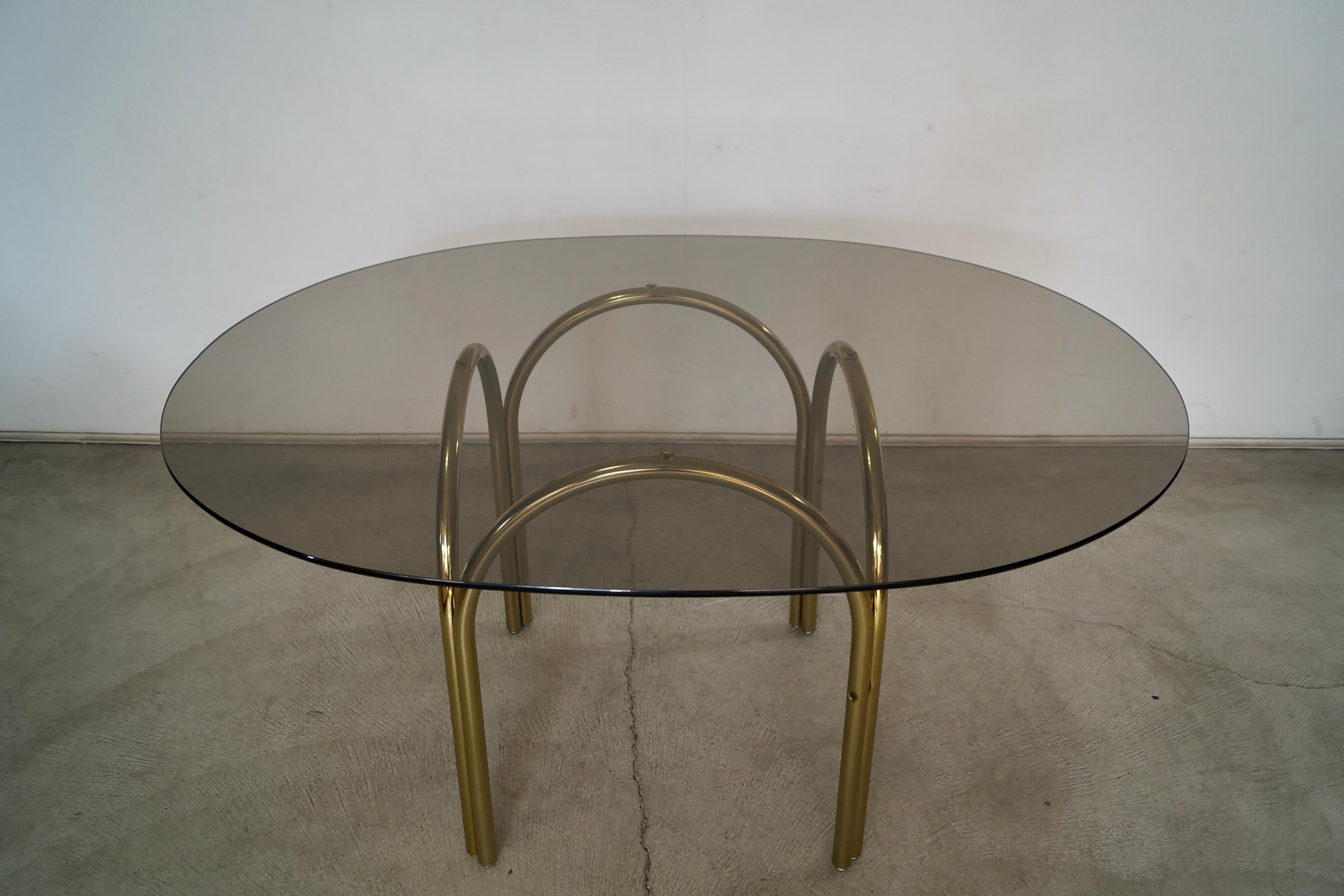 Late 20th Century 1970's Art Deco Hollywood Regency Brass & Smoked Glass Dining Table For Sale
