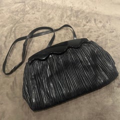 1970s Art Deco Style Black Leather and Bakelite Clutch by Colombetti Milano