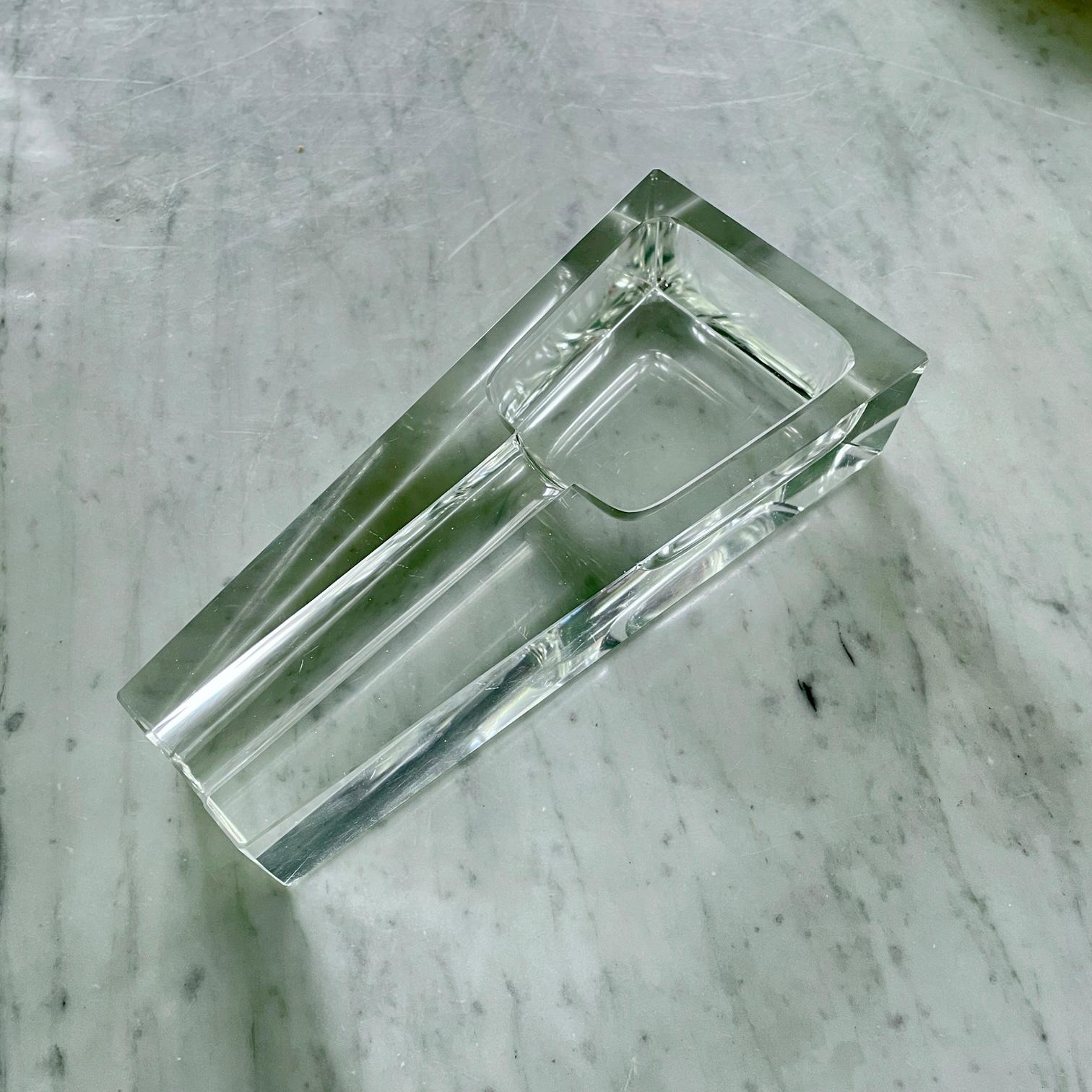 Wonderful geometric simplicity, heavy 1970s cut and polished crystal design, clear. No makers markings. There is a ridge at end of tube form for cutting cigar end with a round tipped blade, this is something I have not seen in previous ashtrays.

L: