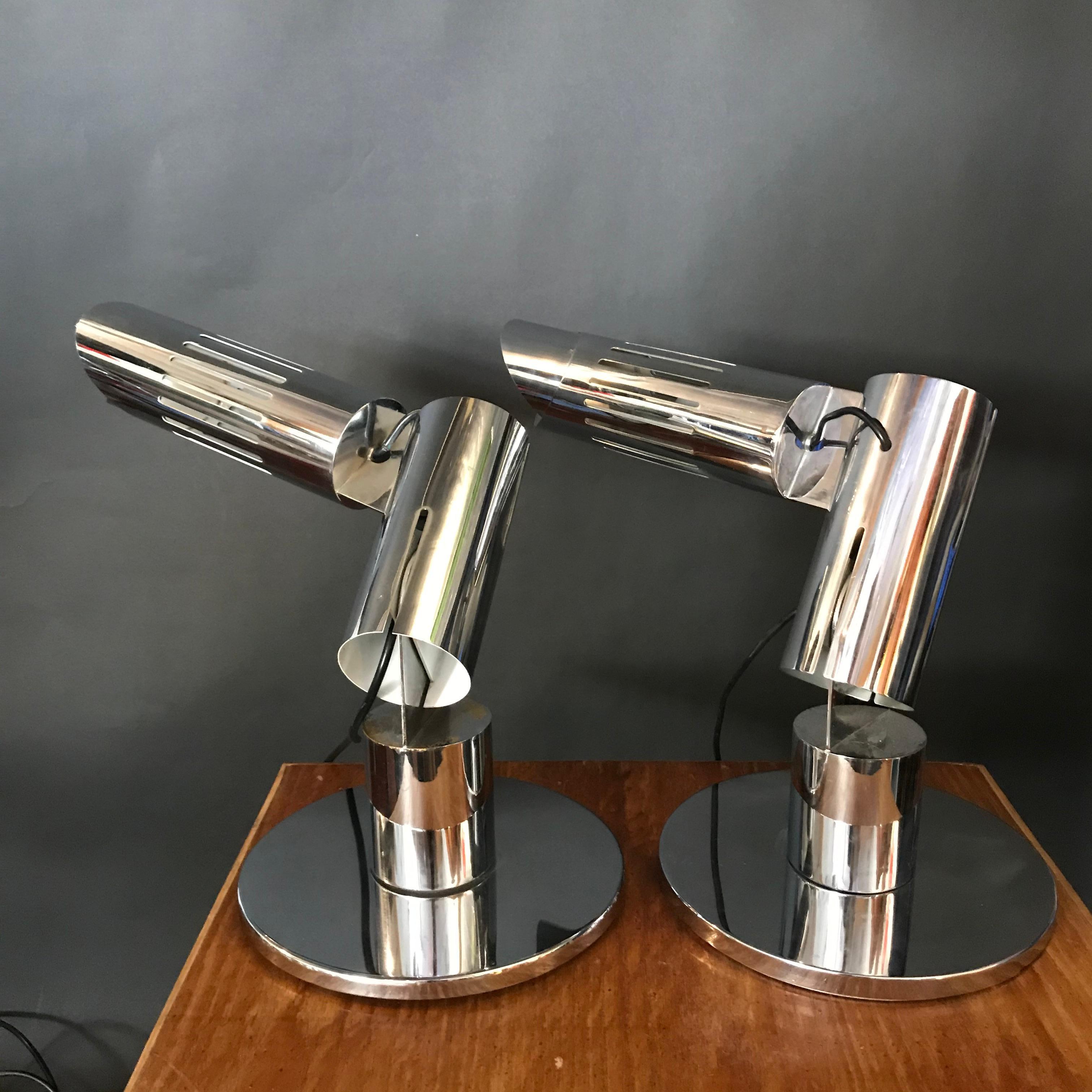 Rare pair of 1970’s Italian Articulating Chrome Plated brass table lamps designed by Gabriel D’Ali made by Francesconi composed of interlocking hinged cylinders and illuminated through slits cut into the outer fixed and an inner rotating cylinder