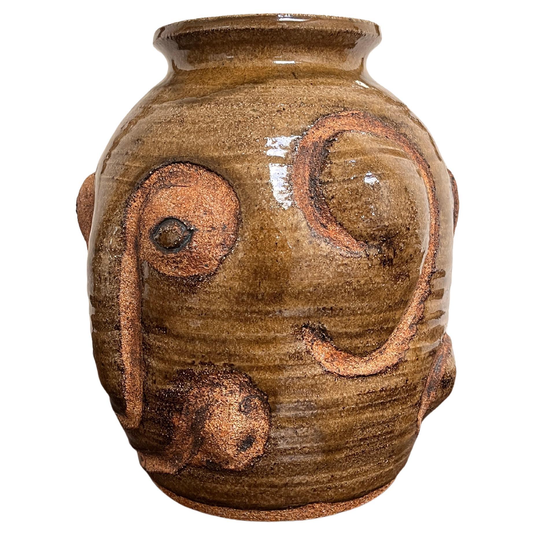 1970's artist-made abstract face vase.