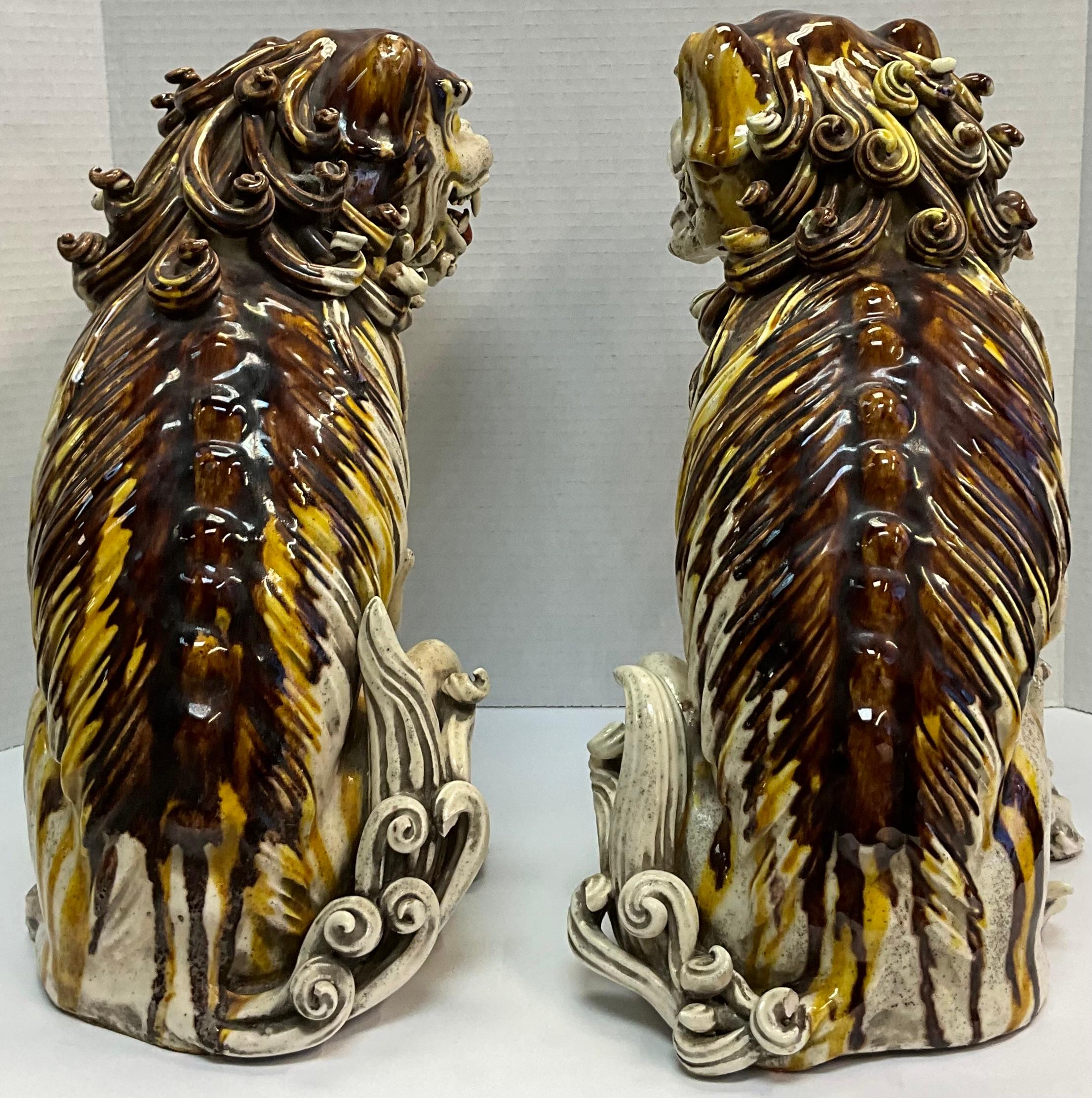 20th Century 1970s Asian Chinese Export Fierce Facing Drip Glaze Pottery Foo Dogs, Pair For Sale