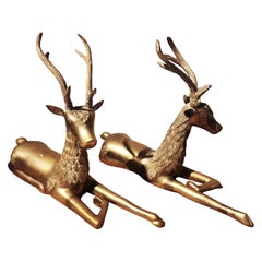 1970s Asian Style Pair of Reclining Deer in Solid Bronze.