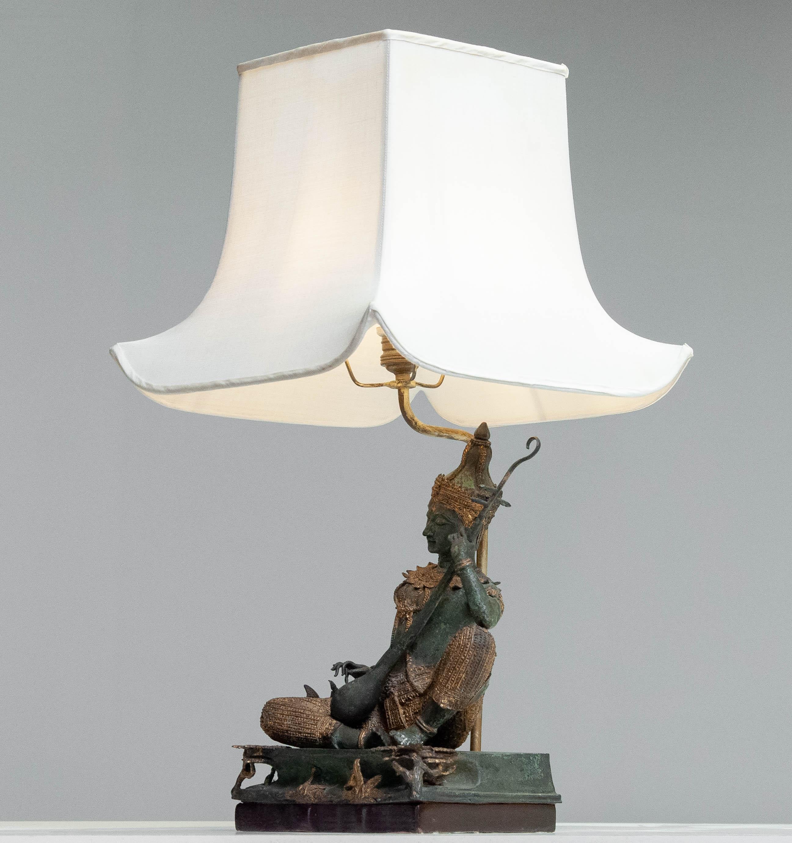 Brass 1970s Asian Vintage Table Lamp with Bronze / Gild Statue of Phra Aphai Mani For Sale