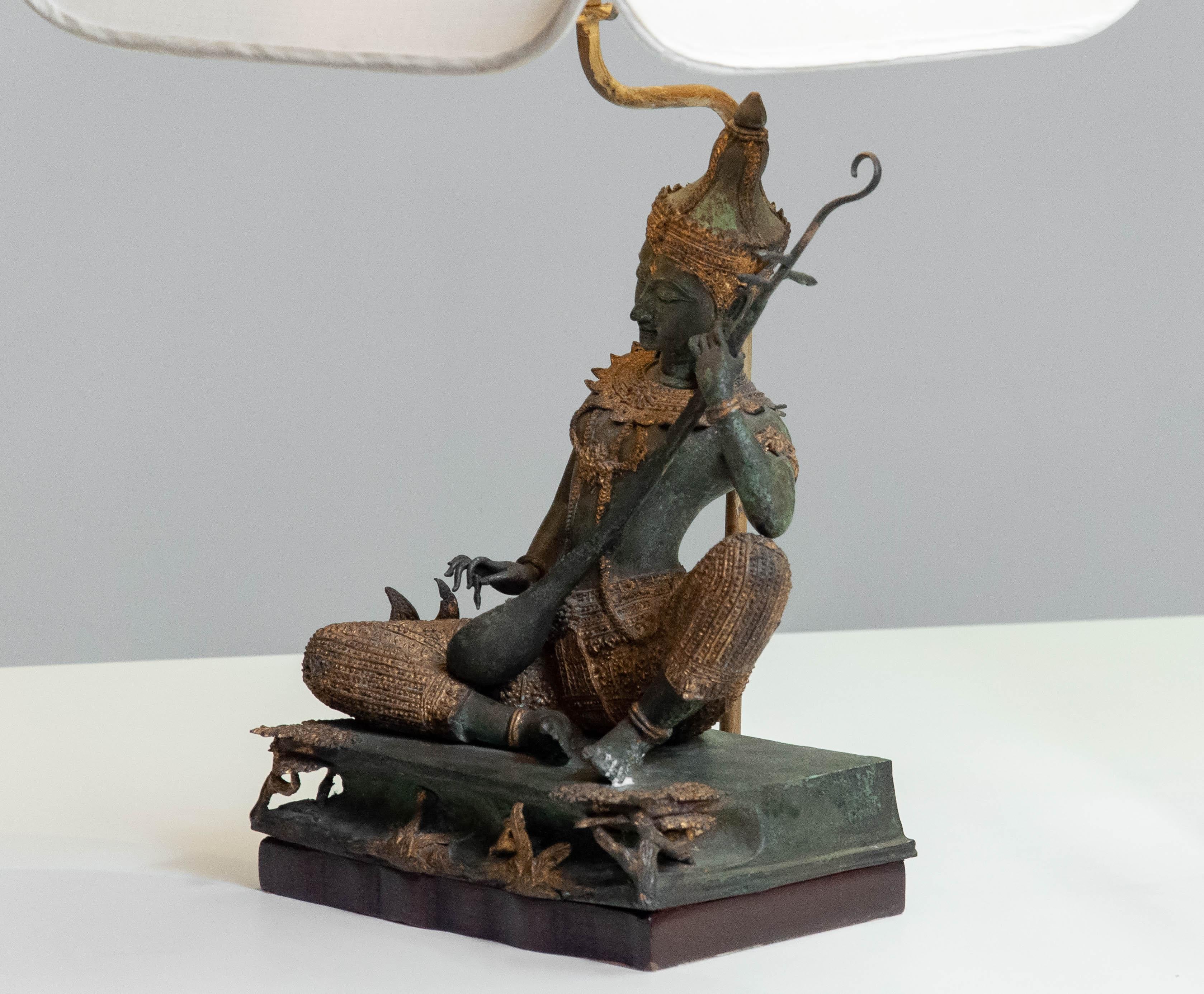 Brass 1970s Asian Vintage Table Lamps with Bronze / Gild Statues of Phra Aphai Mani For Sale