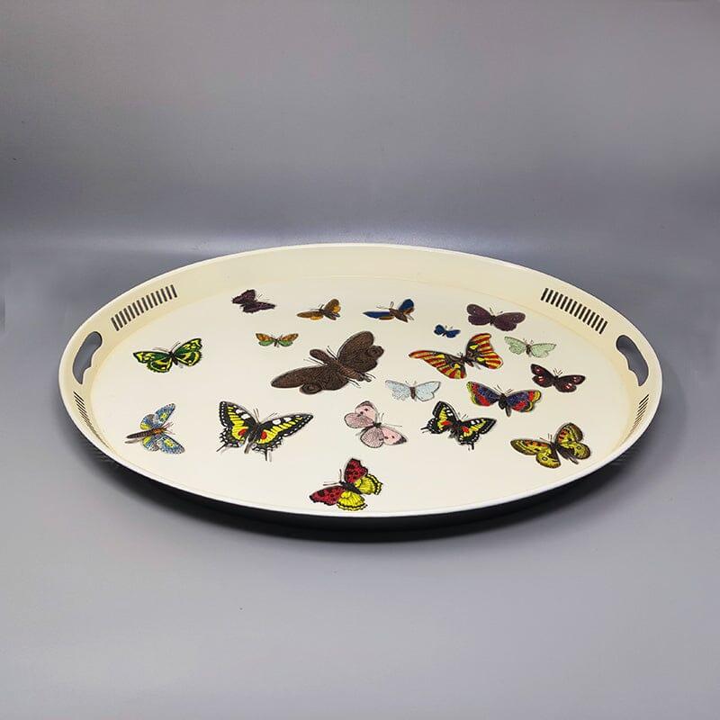 1970s Astonishing oval metal tray by Piero Fornasetti. Made in Italy
It's in excellent condition and is signed at the bottom.
Dimension:
20,47