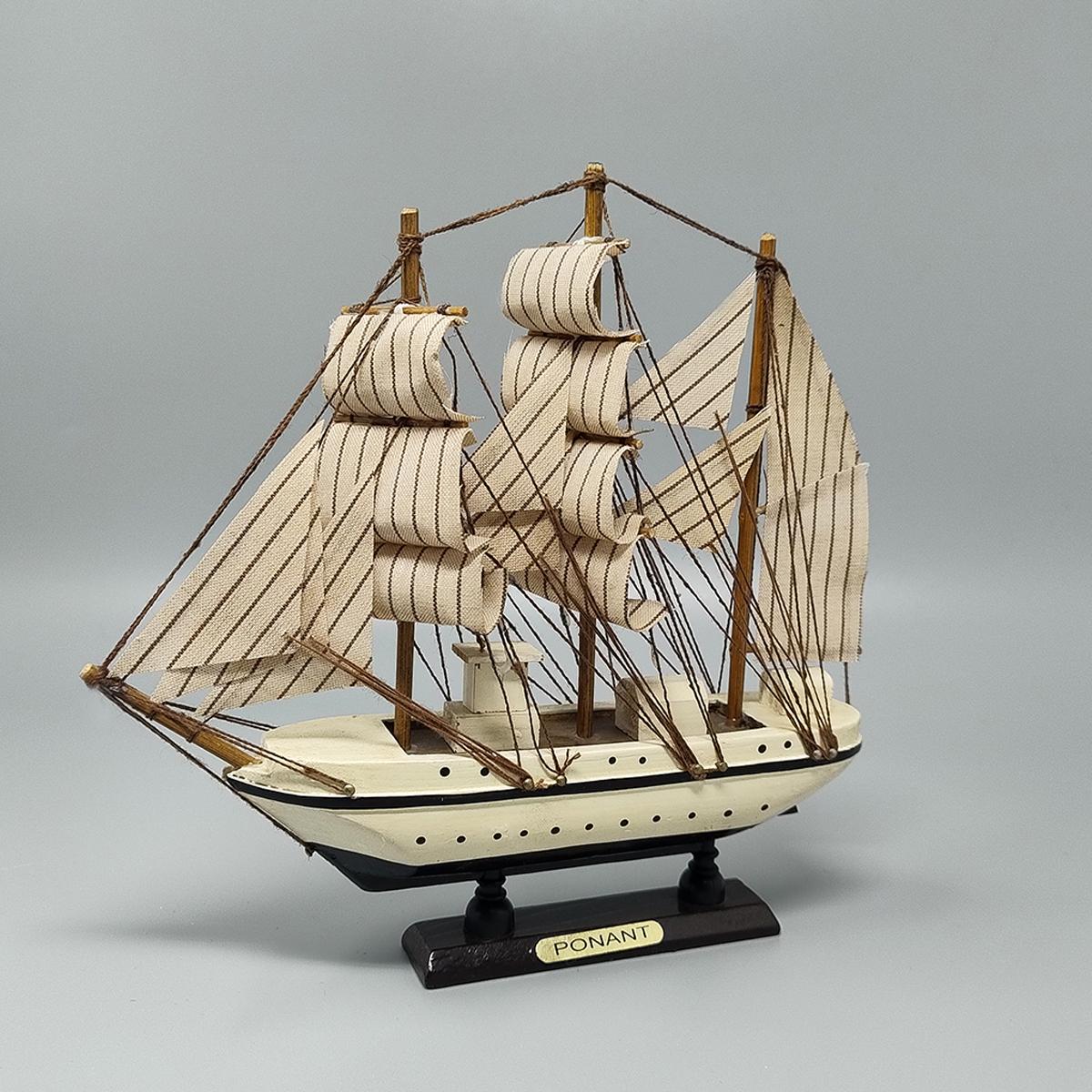 1970s Astonishing Ponant model ship in walnut wood. Handmade. Made in England. This model is amazing and in excellent condition and all handmade. A true piece of history.
Dimension: 
8,26 x 1,57 x 7,87 H inches
cm 21 x cm 4 x cm 20 H