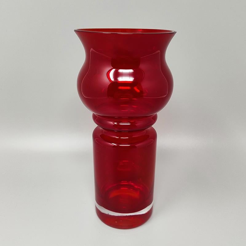 1970s Astonishing red Tulppaani (#1513) by Tamara Aladin for Riihimaki/Riihimaen Lasi Oy. The item is in excellent condition. Made in Finland. This vase is a sculpture and is part of the history of Scandinavian design. 
Dimension:
diameter 3,54 x