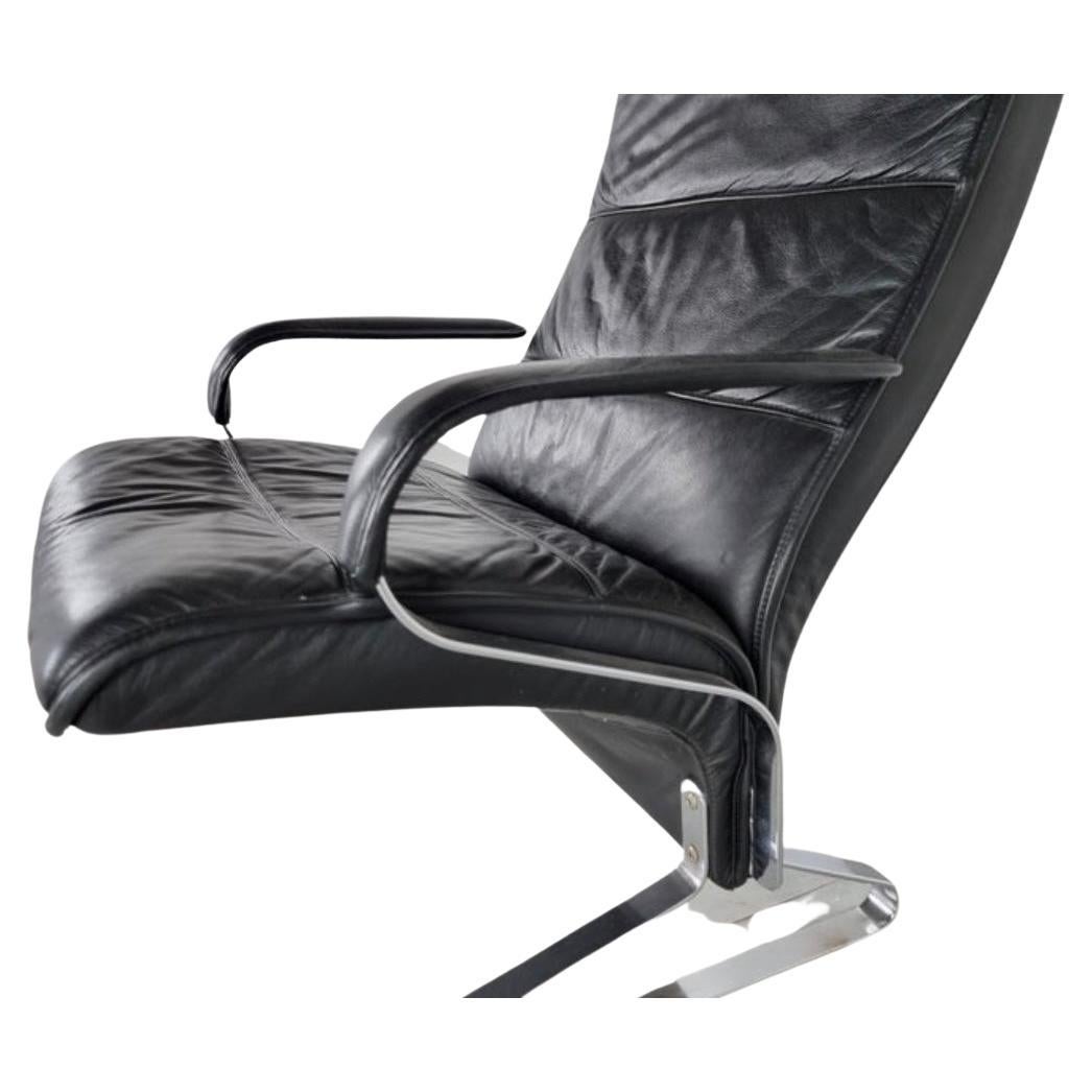 Mid-Century Modern 1970s att Kasthom & Fabricius Black Leather and Chrome Lounge Chair with Ott For Sale