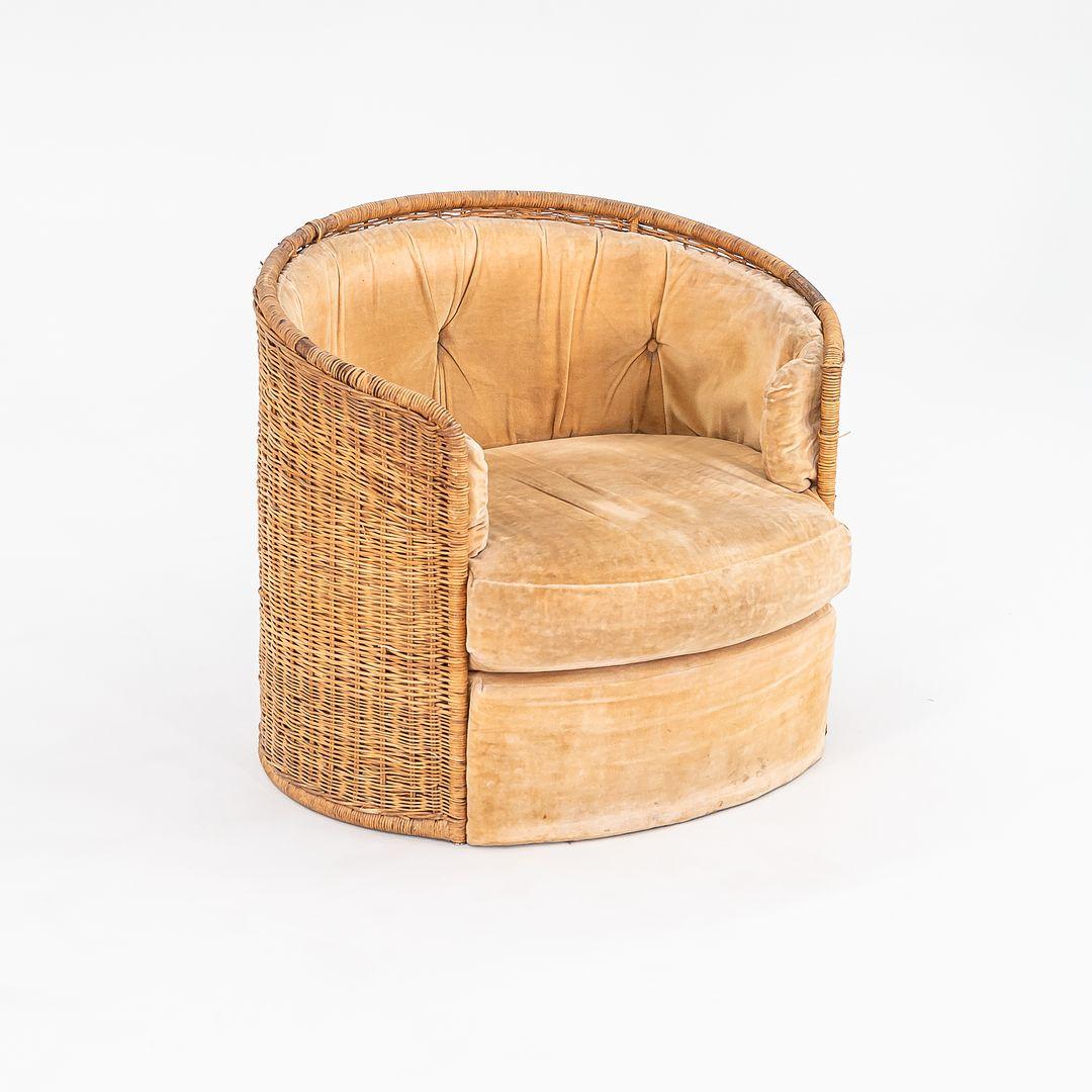 This is a round rattan barrel lounge chair attributed to Adrian Pearsall for Comfort Designs in the 1970s. This design may have been part of Pearsall‚Äôs ‚ÄòSingapore Collection‚Äô. It was manufactured in Honduras, composed of baby rattan reeds