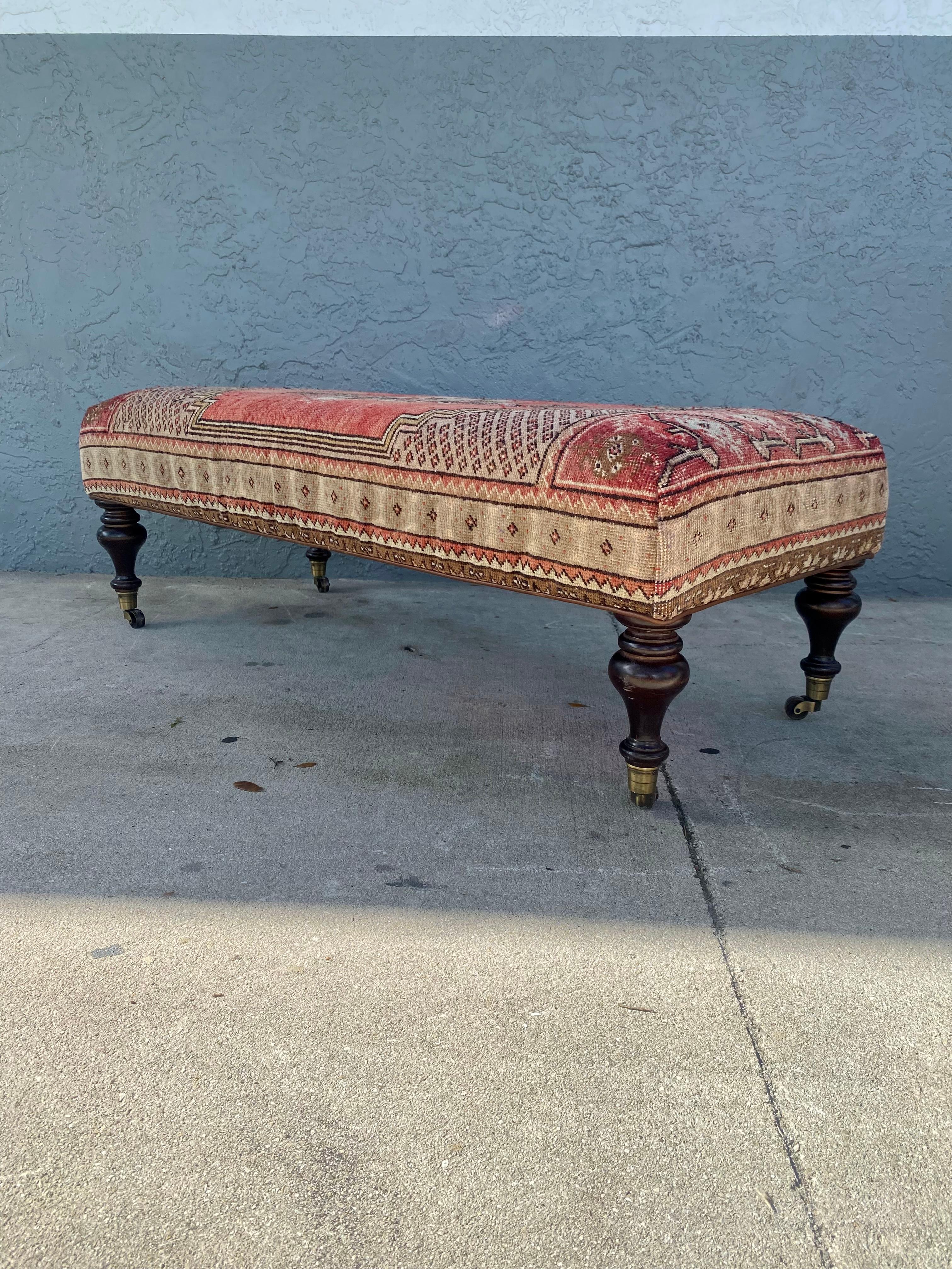 On offer on this occasion is one of the most stunning Kilim wool bench on brass castors you could hope to find. Beautiful leather trimmings on the bottom of the bench.This is an ultra-rare opportunity to acquire what is, unequivocally, the best of
