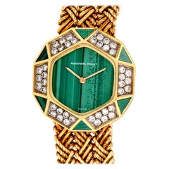 montre Audemars Piguet pour femme en or jaune 18 carats:: diamants et malachite:: années 1970