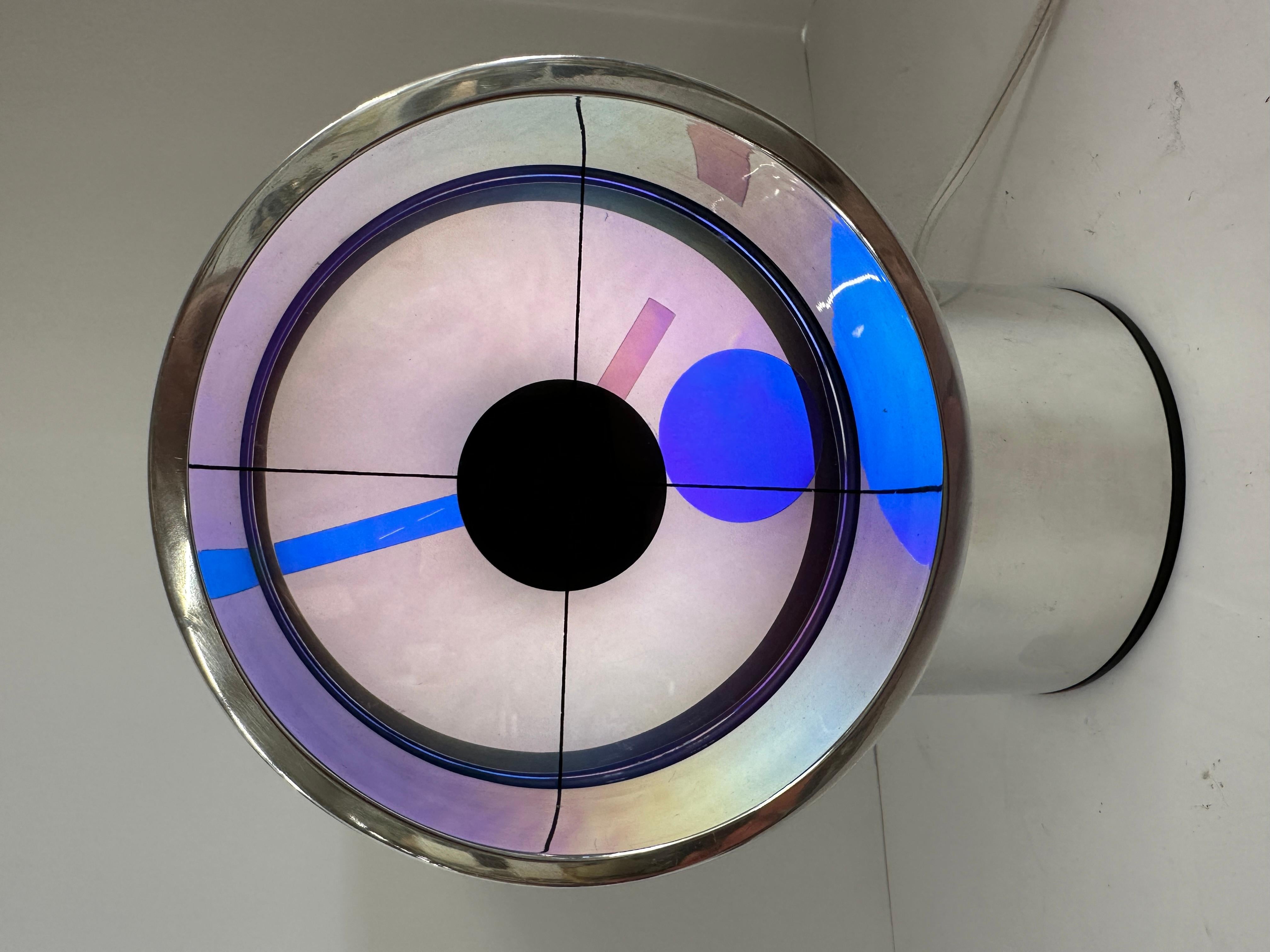 A vintage 1970's Aurora clock. These stunning clocks are in the collection of the Museum of Modern Art MOMA in NY. Developed in the 1970's by a NASA engineer and an architect these stunners were first produced by Rathcon and later for mass
