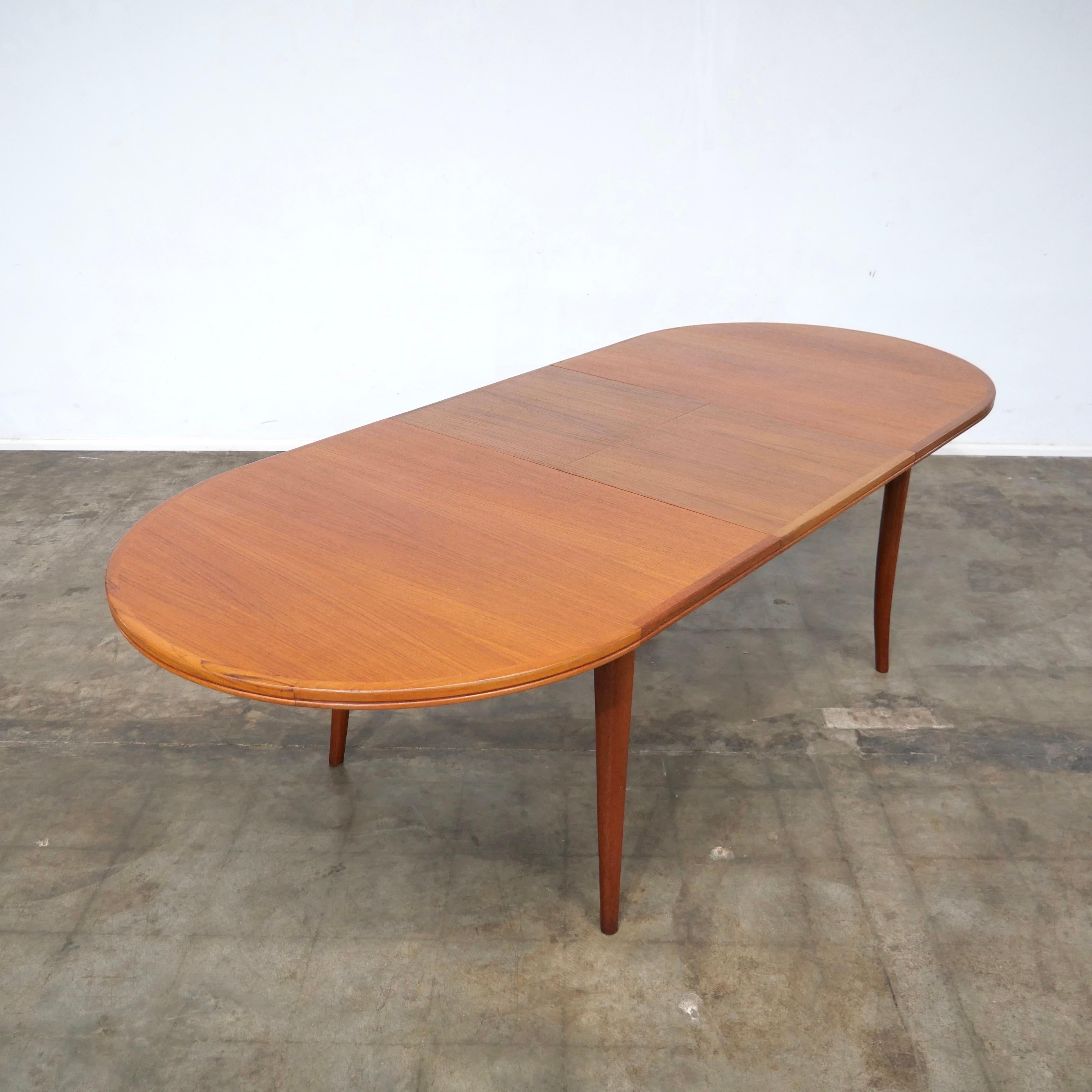 1970's Parker extentiona dining table. 

Freshly sanded and refinished with three coats of hard wax oil for longevity.

Contracted L 177cm, W 100cm, H 72cm Extended L 233cm

located in Wollongong Australia. 

please contact us for an australia wide