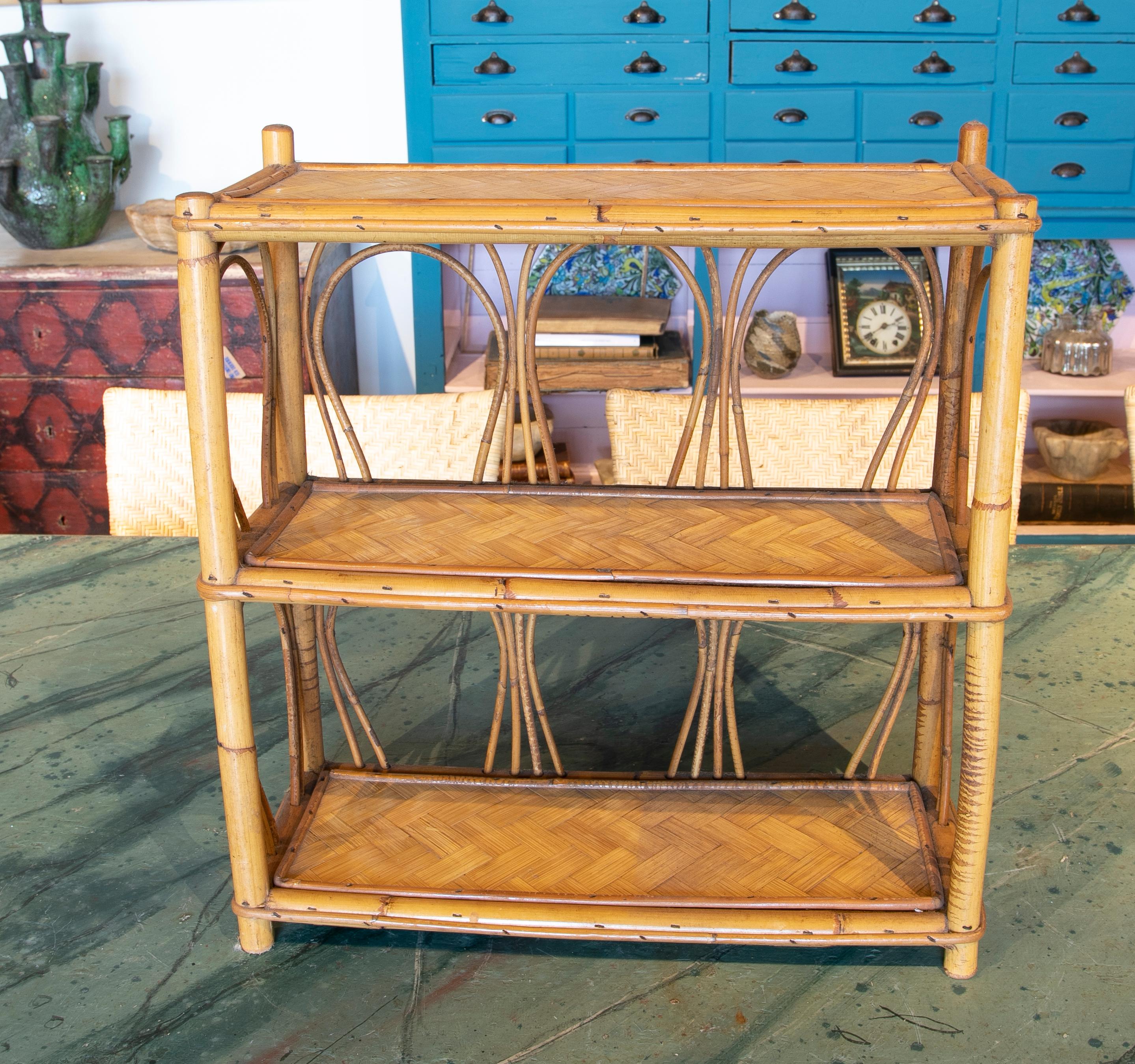 1970s bamboo and wicker bookshelf.