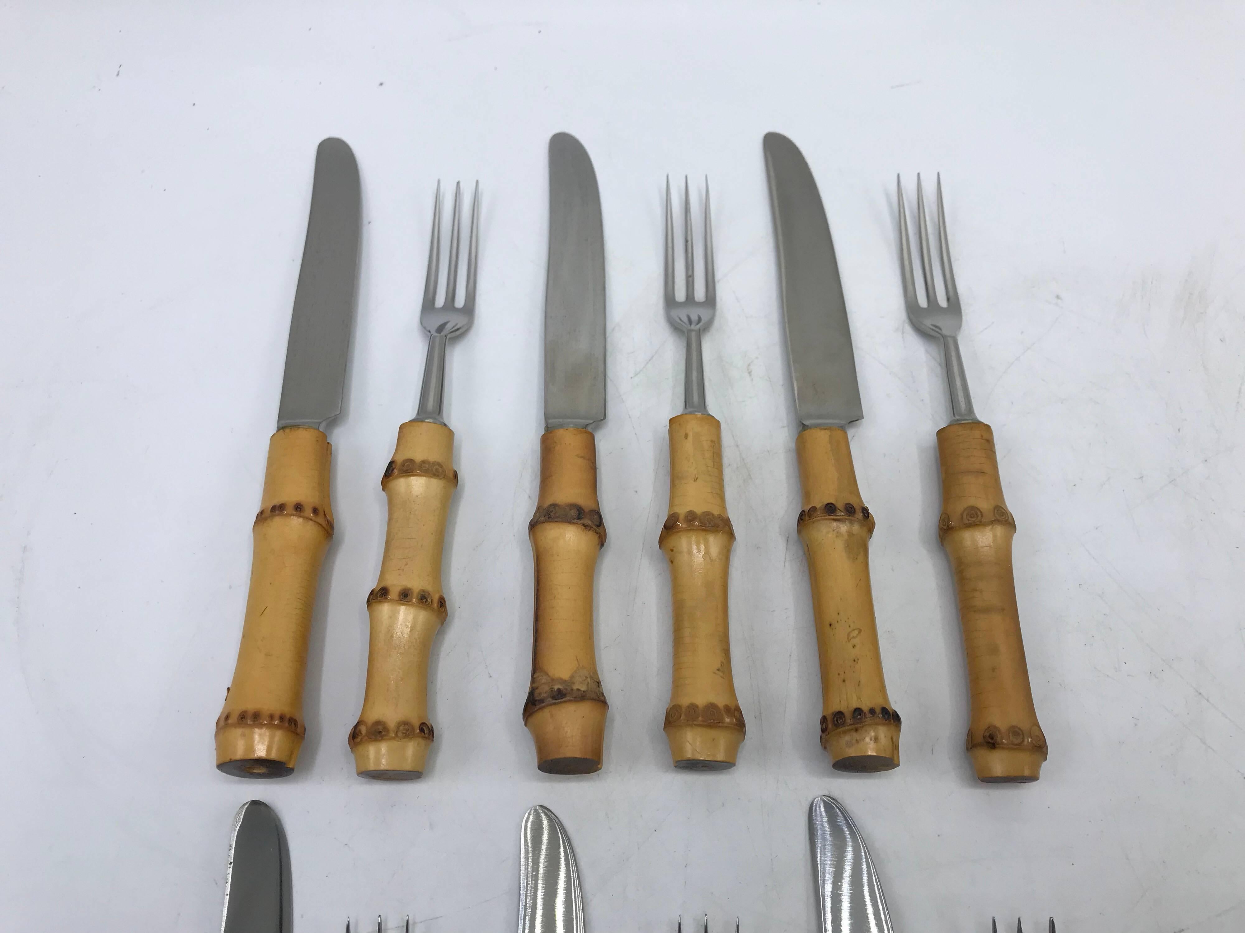 Listed is a fabulous, set of service for six, 1970s bamboo handled hors d’oeuvres fork and knife set. The set looks unused and is in excellent condition. 

Measures: Knife measures 6.5” long. Fork measures 5.75” long.