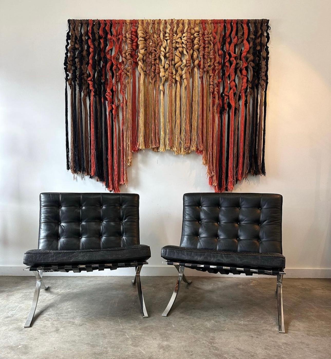 Pair of iconic 1970's Barcelona chairs by Knoll that were designed by Ludwig Mies van Der Rohe. This pair was lovingly maintained by their longtime owners. The chrome plated frame is solid and strong. The leather upholstery and straps are similarly