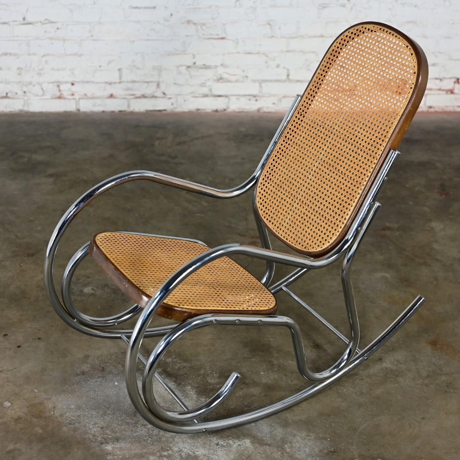 Marvelous vintage Bauhaus style rocking chair or rocker comprised of a chrome tube frame and bentwood trim surrounding a cane seat & back. Beautiful condition, keeping in mind that this is vintage and not new so will have signs of use and wear even