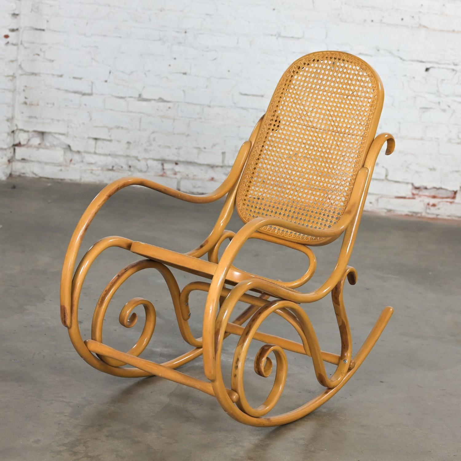 Lovely vintage Bauhaus style #7025 bentwood & cane rocking chair or rocker. Beautiful condition, keeping in mind that this is vintage and not new so will have signs of use and wear even if it has been refinished or restored. Specifically, it has