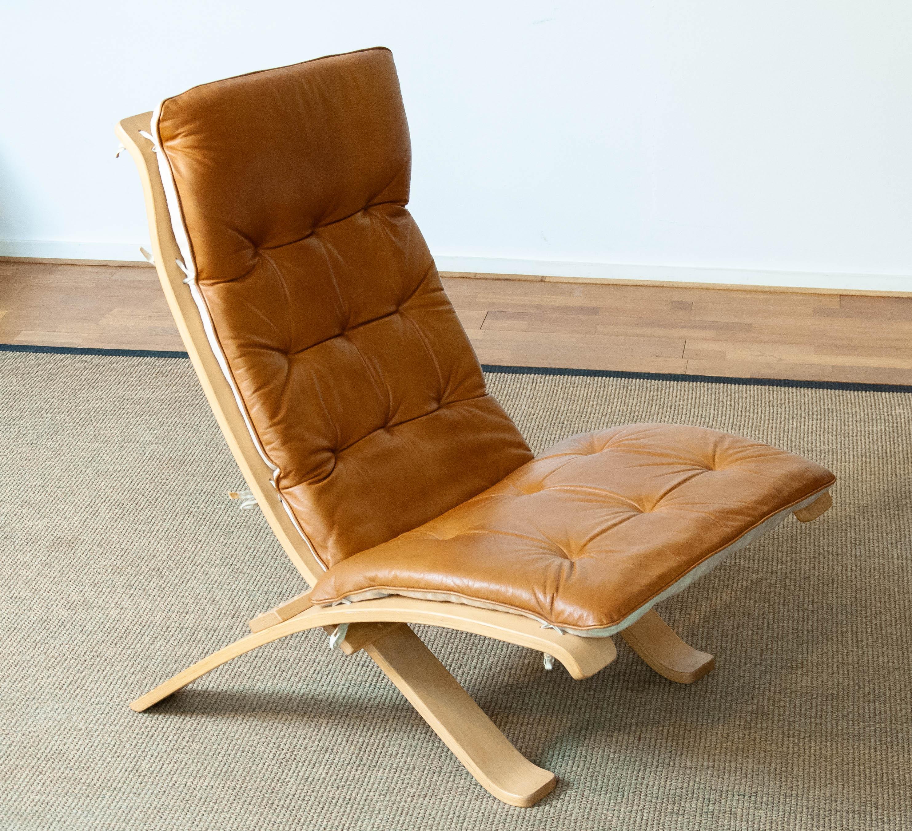 Scandinavian Modern 1970's Beech Bentwood with Cognac Leather Folding Lounge Chair by Nelo, Sweden For Sale
