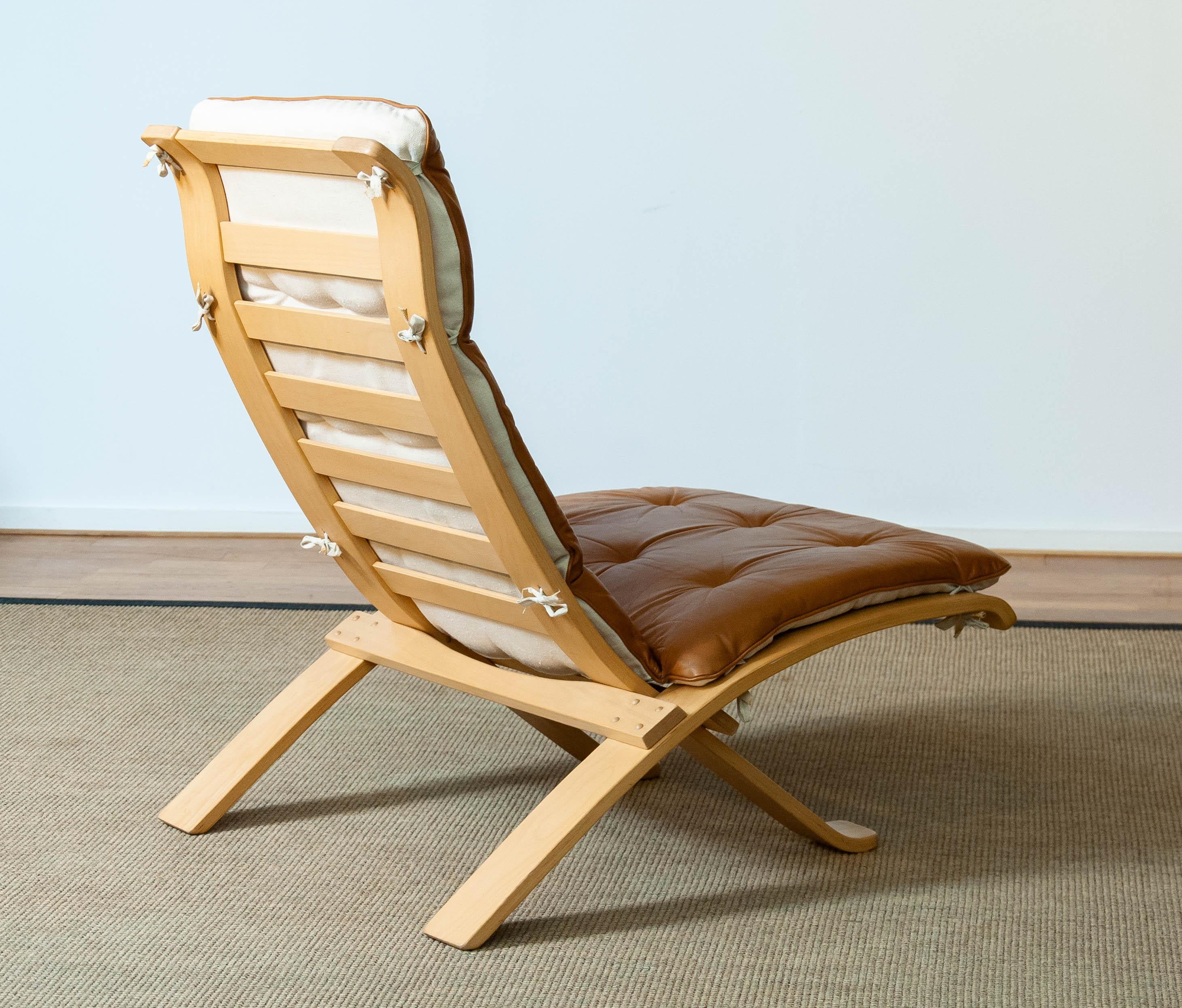 Swedish 1970's Beech Bentwood with Cognac Leather Folding Lounge Chair by Nelo, Sweden For Sale