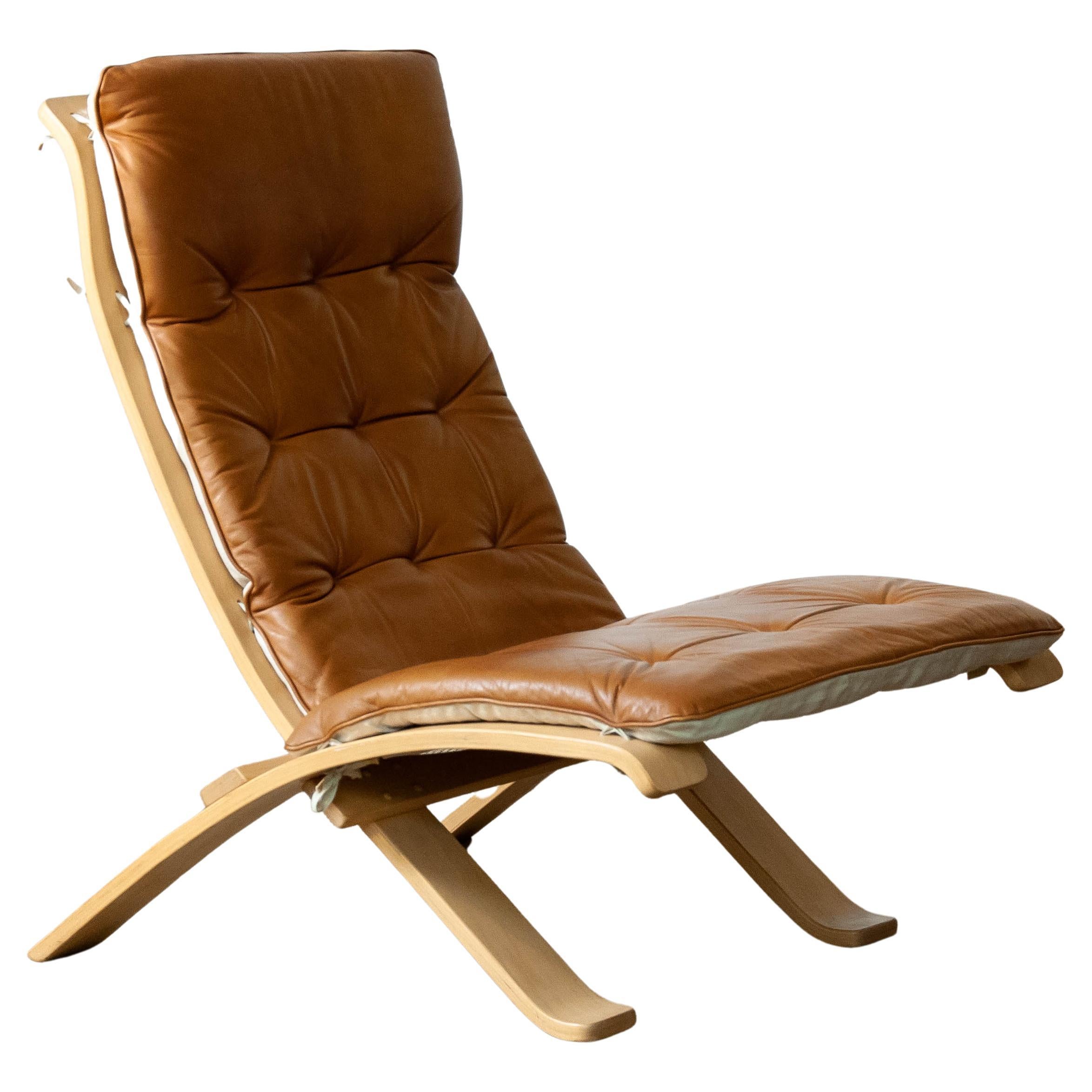 1970's Beech Bentwood with Cognac Leather Folding Lounge Chair by Nelo, Sweden For Sale
