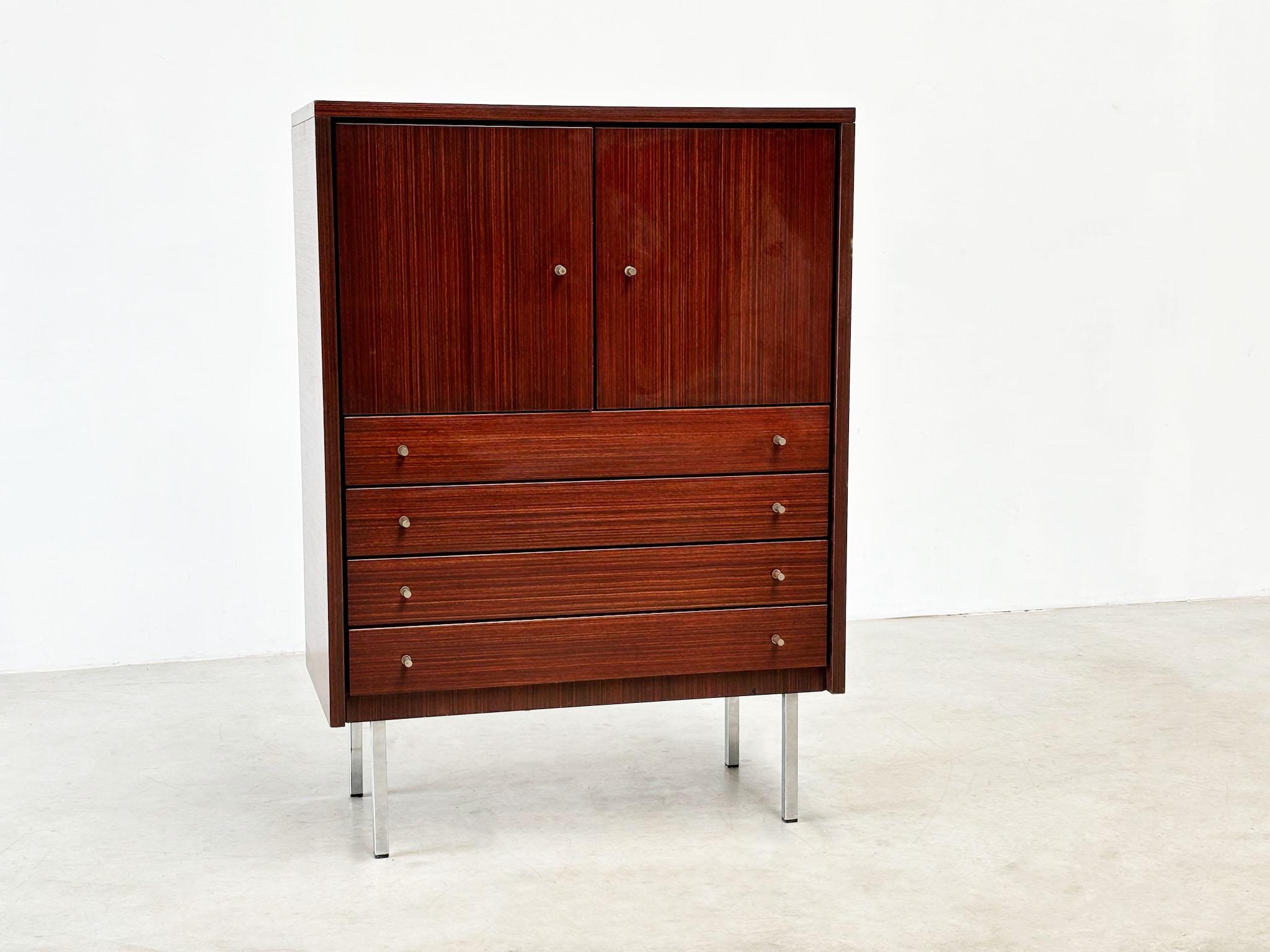 1970's Belgian bar / storage cabinet
Lovely Belgian bar or storage cabinet straight out of the 70's. 

This elegant cabinet with 4 drawers is a perfect example of pure vintage elegant furniture. It features 4 drawers and 2 seperate cabinets. It has