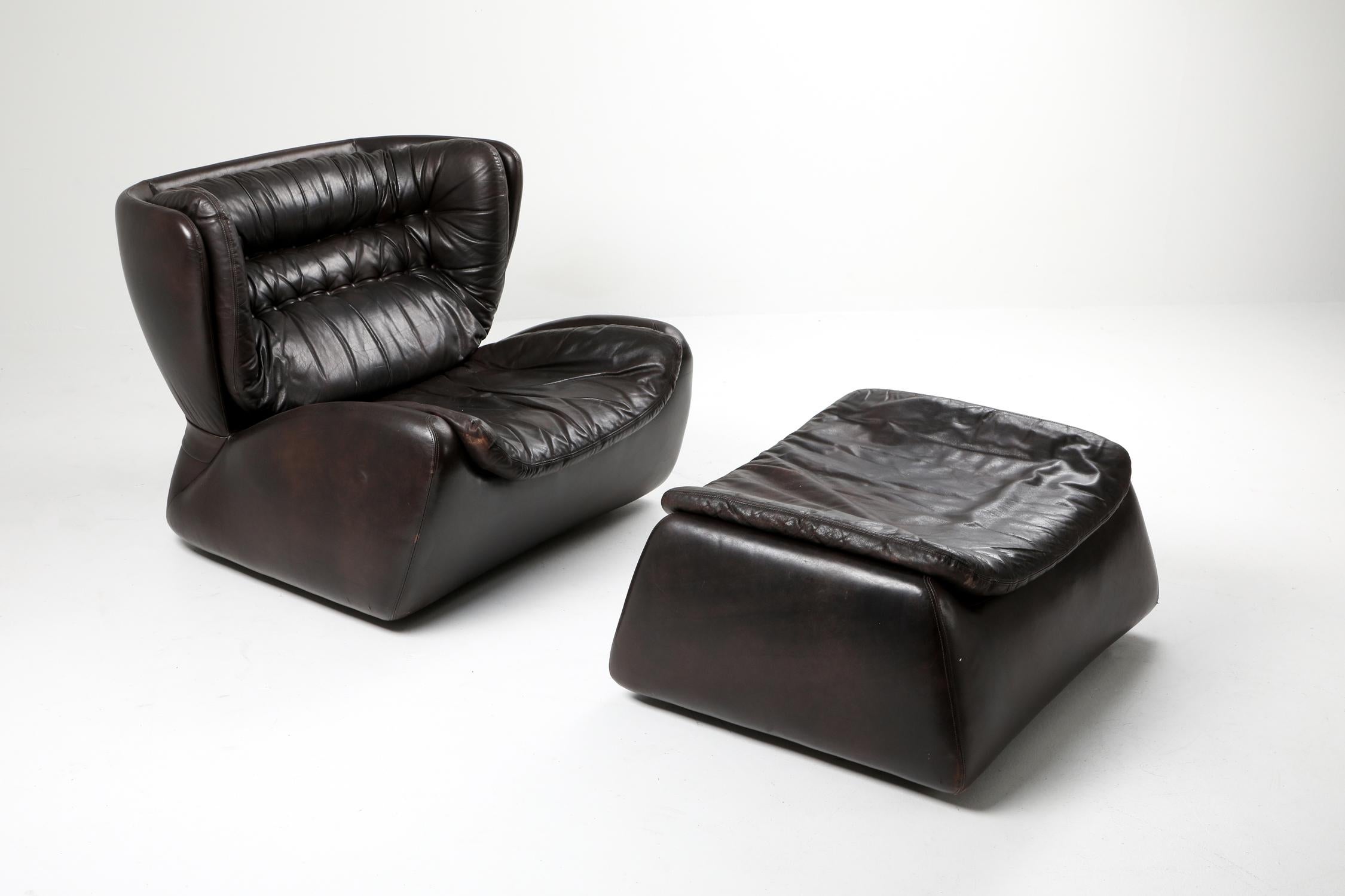 Heinz Waldmann & Anita Schmidt lounge chair and ottoman for Durlet in 1970, dark chocolate brown leather, 

Durlet is a luxury leather furniture brand from Belgium, very much like De Sede in Switserland.

In the 1970s, they had a large selection