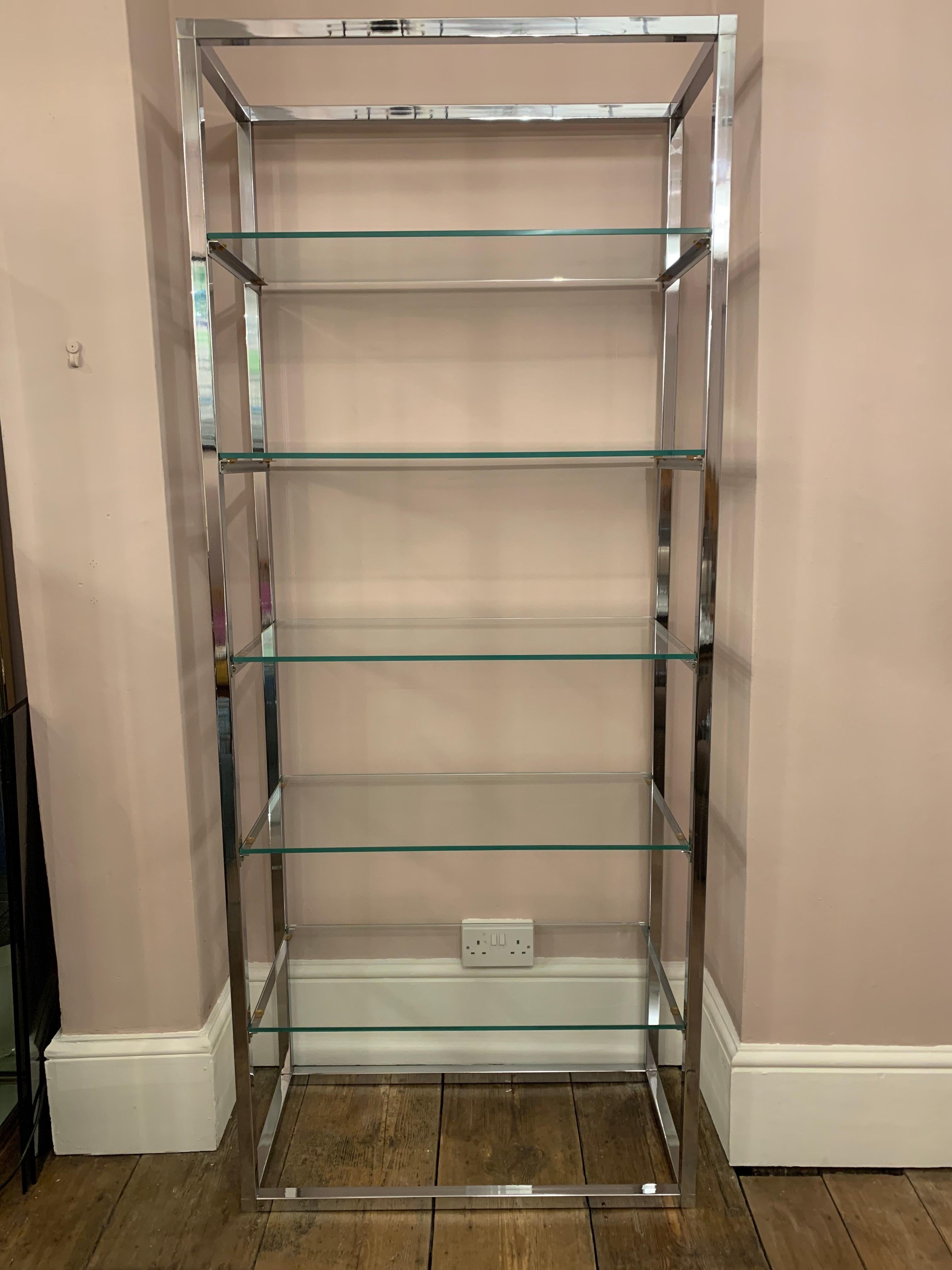 1970s Belgium vintage polished chrome and thick clear glass étagère or shelving unit. A simple yet functional design which is perfect for displaying books and your favourite objet. Each of the five shelves supports a thick glass pane of glass which