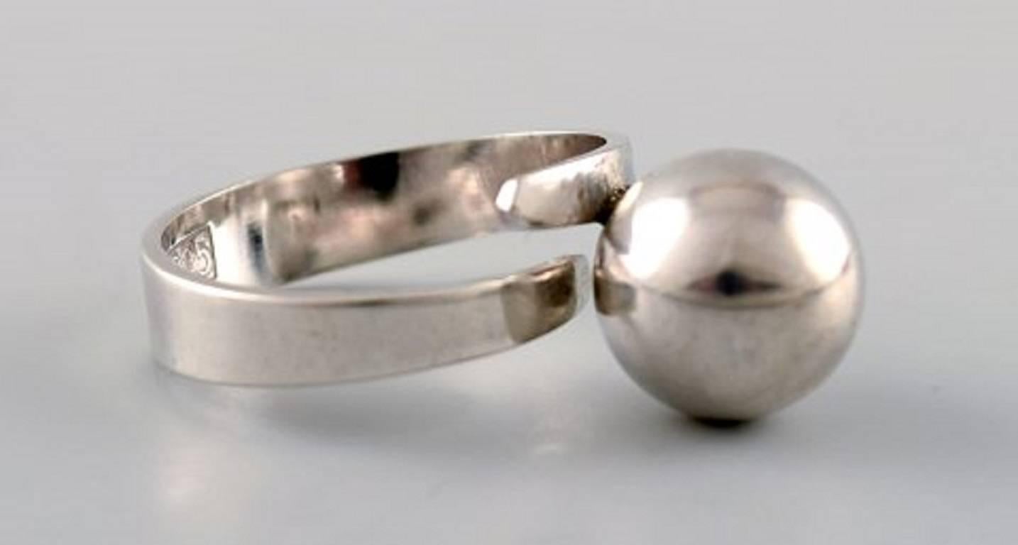BENGT HALLBERG, Swedish modernist sterling silver ring.
Size: 20 mm. US Size 10. 
Our silversmith can adjust to any size for an additional $ 50.
Stamped: 925. 
1970s.
In very good condition.
LARGE SELECTION OF modernist SCANDINAVIAN SILVER FROM