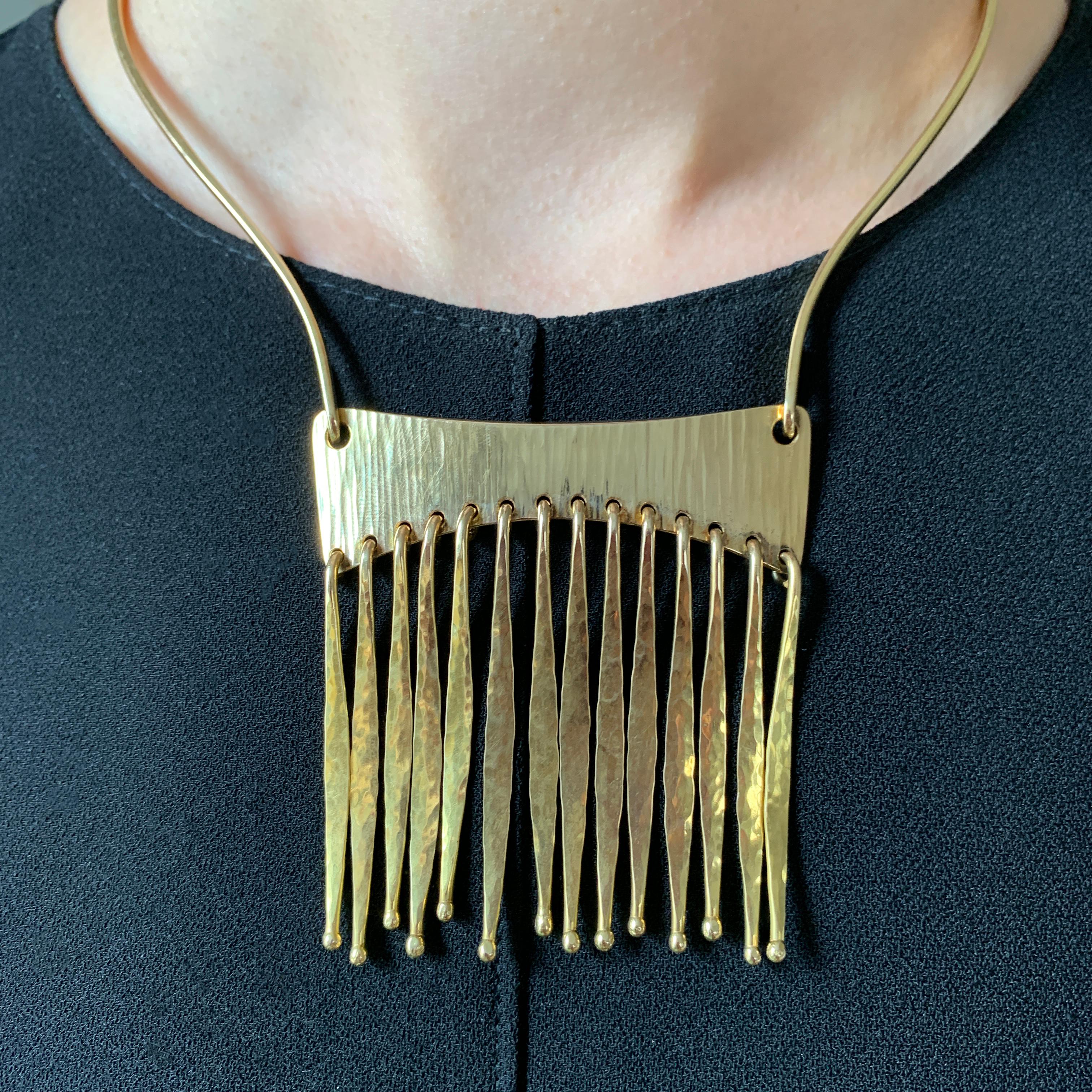 A gold necklace, by renowned master goldsmith Bent Gabrielsen, c. 1970; made in 14 karat gold as was usual in the Nordic Scandinavian style. The neck collar measures 14